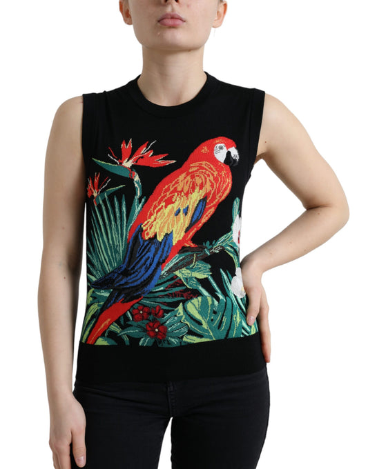 Woman wearing a black tank top with a colorful parrot design