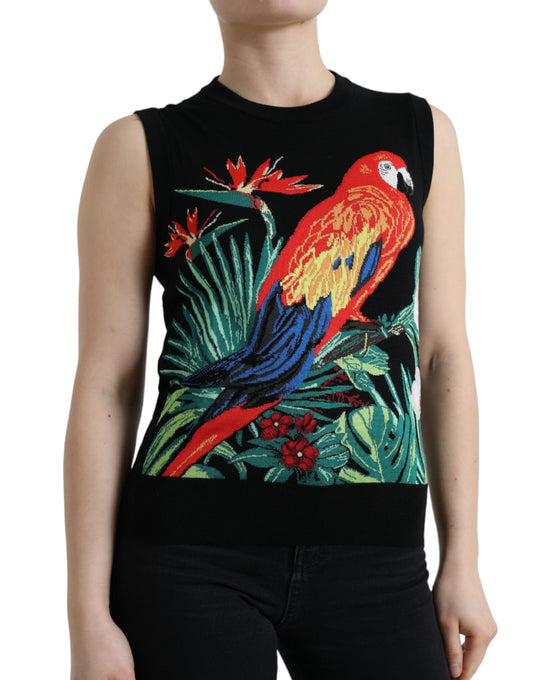 Woman wearing black sweater with colorful parrot design