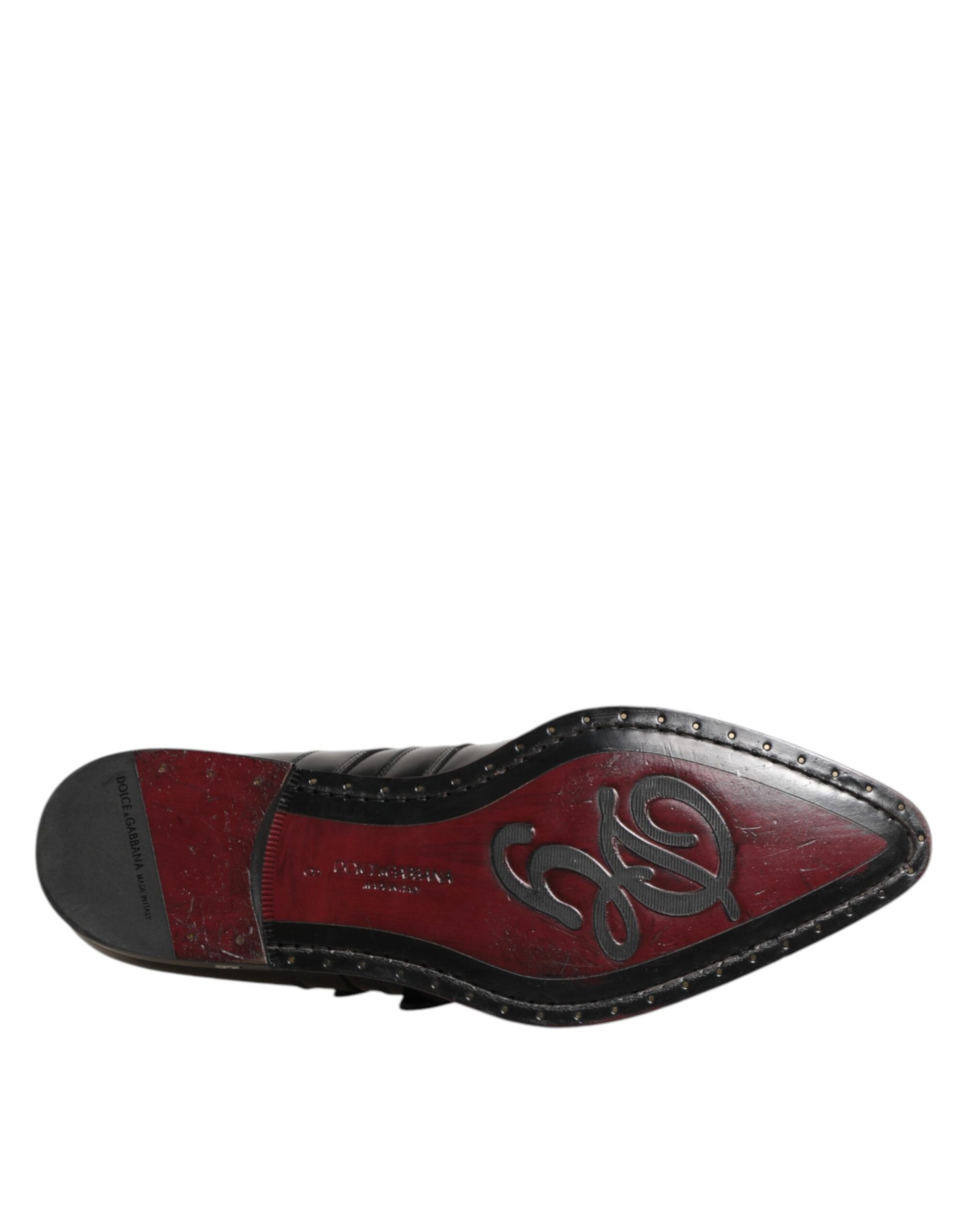 Red and black embellished monkstrap dress shoes with a logo on the side