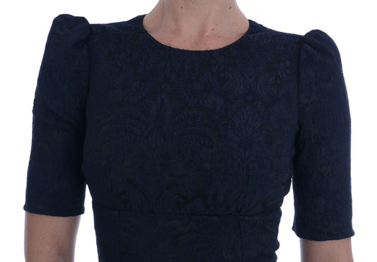 A black blue flare mini dress with short sleeves, a V-neckline and ruffled shoulders