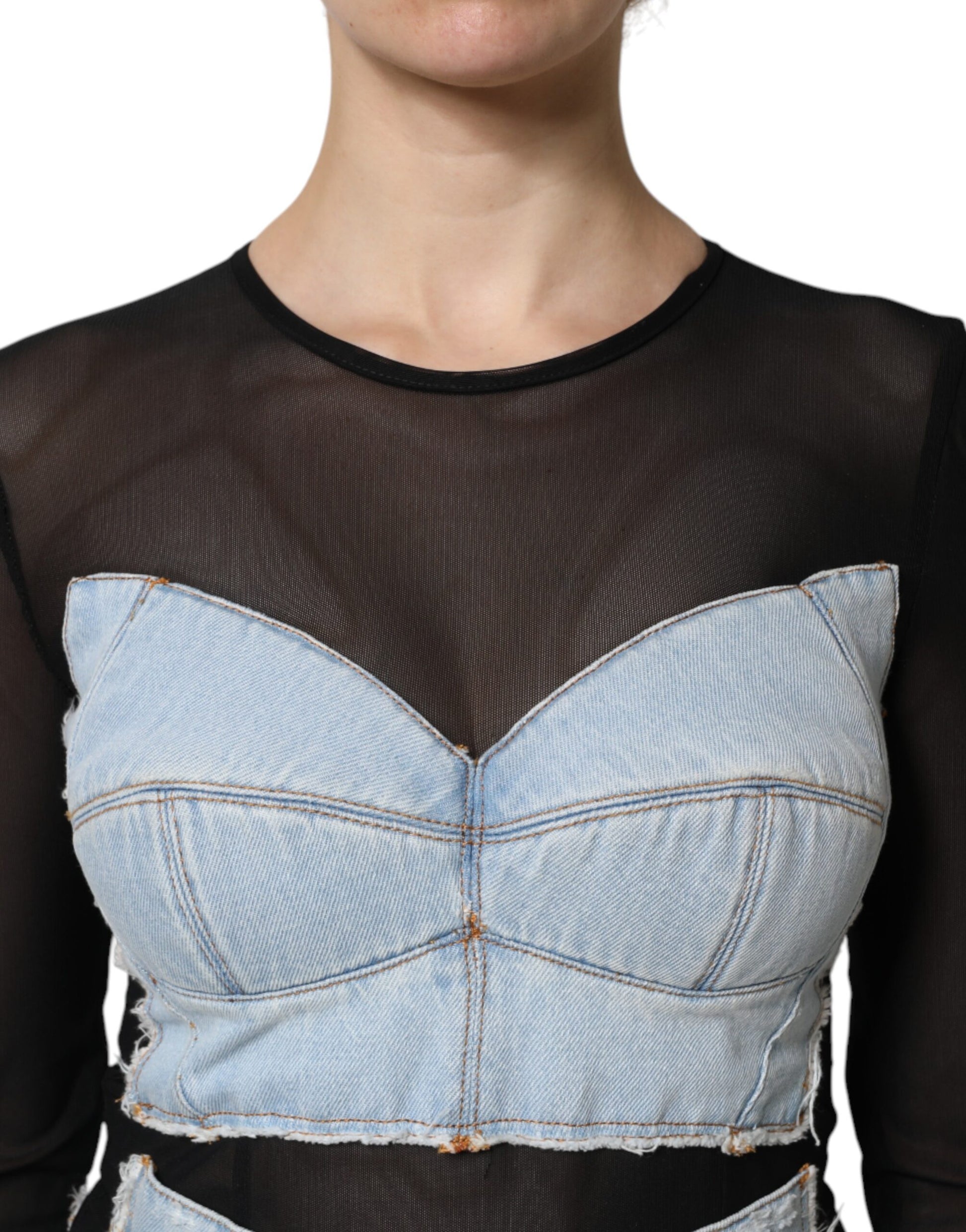 A denim dress with a black mesh top