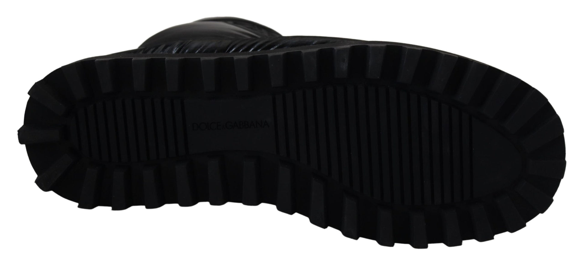 Black boot with white sole and laces