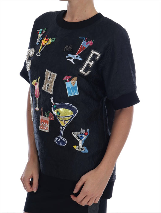 Black t-shirt with various embroidered designs