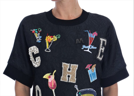 Black sweater with colorful embroidery and sequins