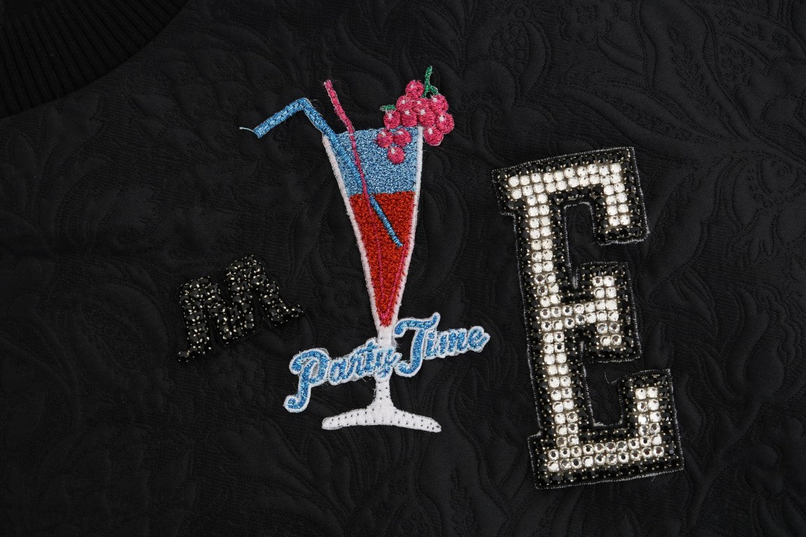 Embroidered drink on a black fabric background