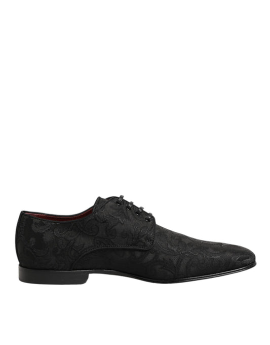 A pair of black brocade lace-up dress shoes by Dolce & Gabbana