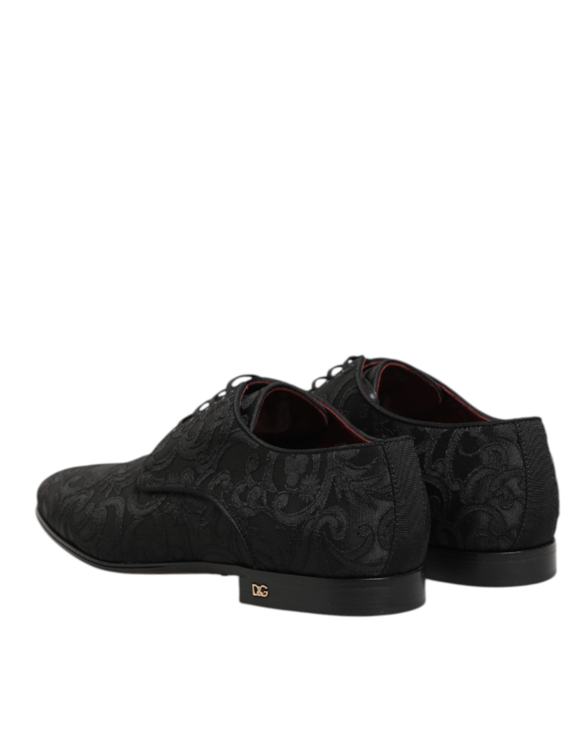 Pair of black brocade lace up dress shoes with gold accents