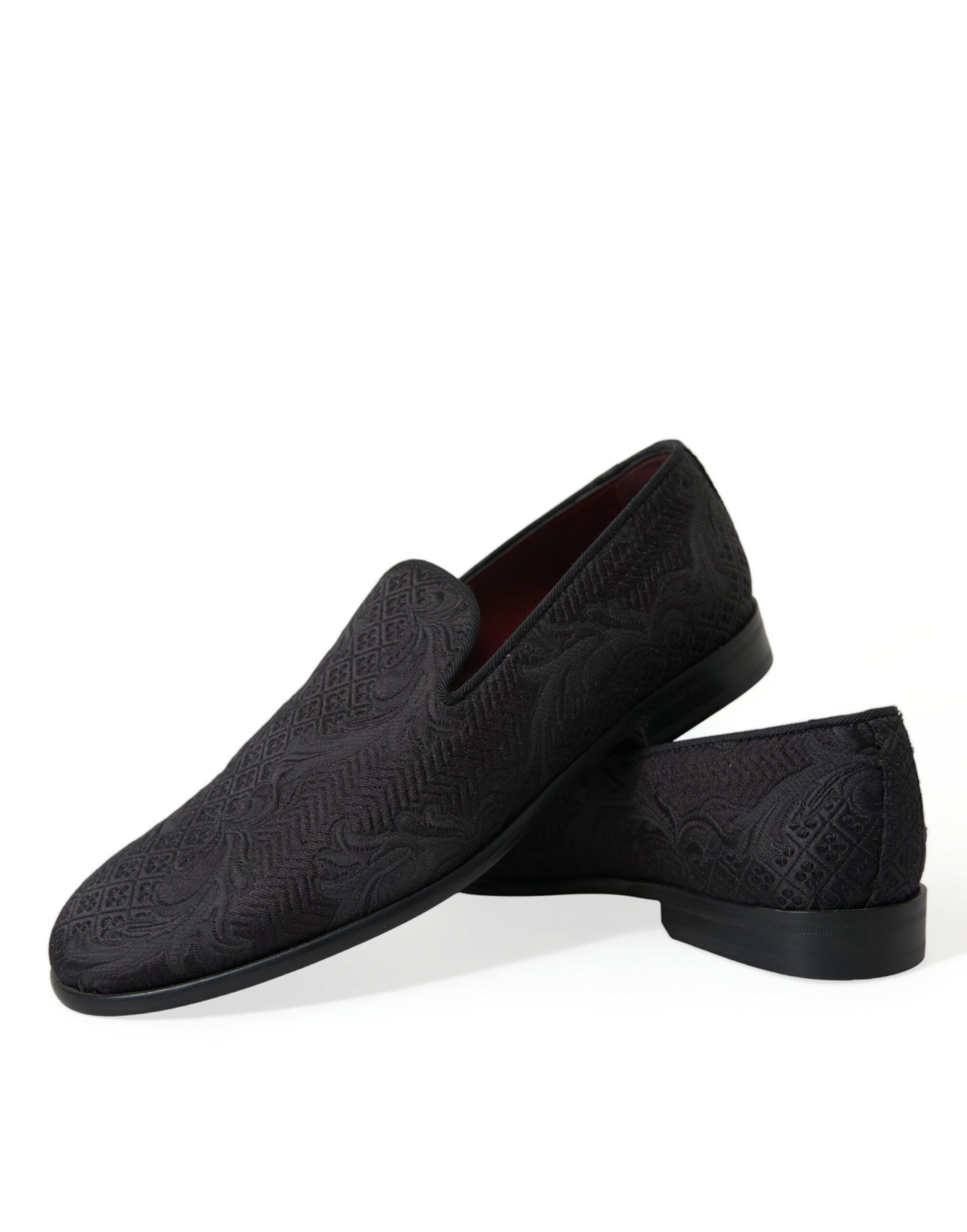 Pair of black loafers with patterned soles