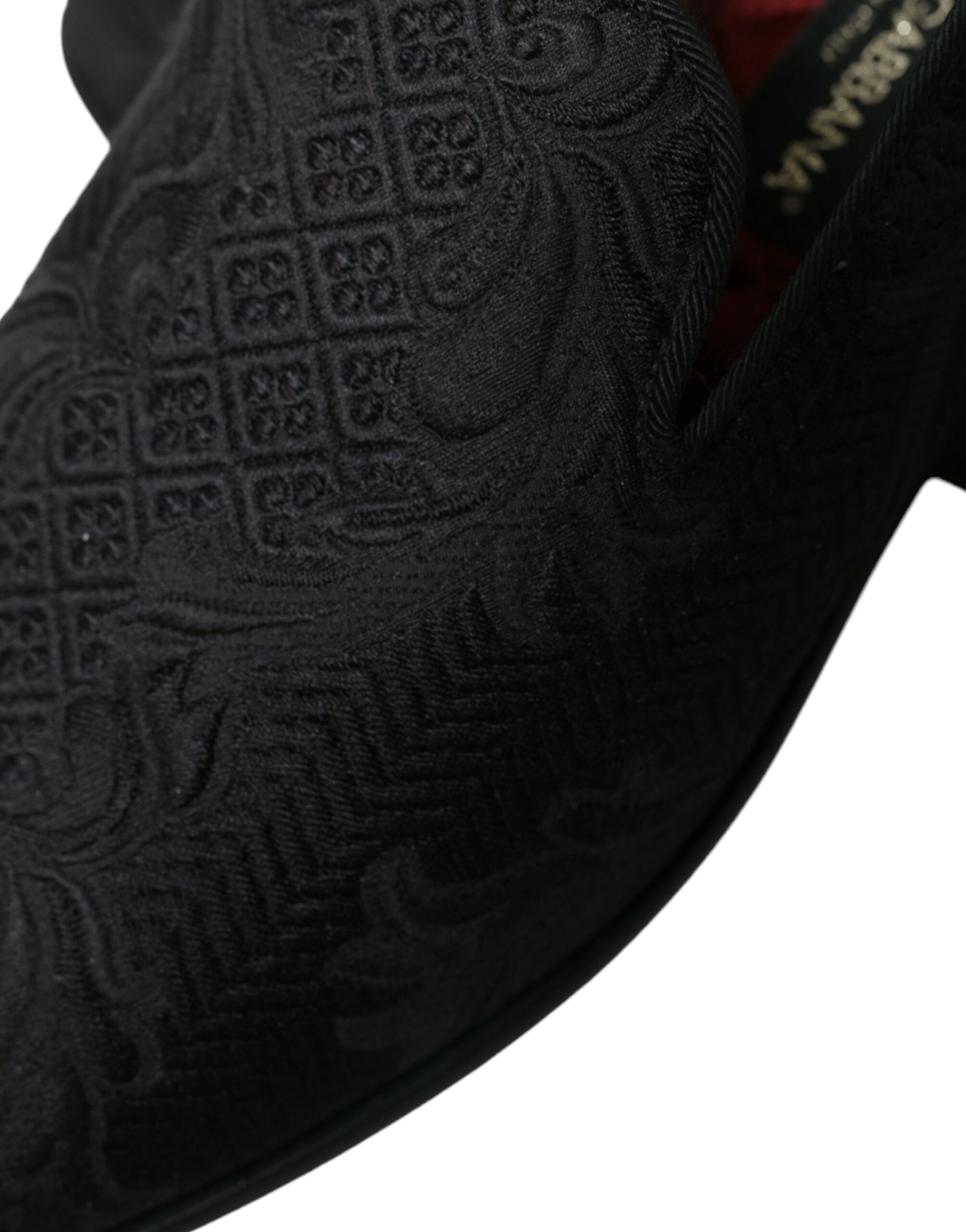 Black velvet slipper with embroidered design on top