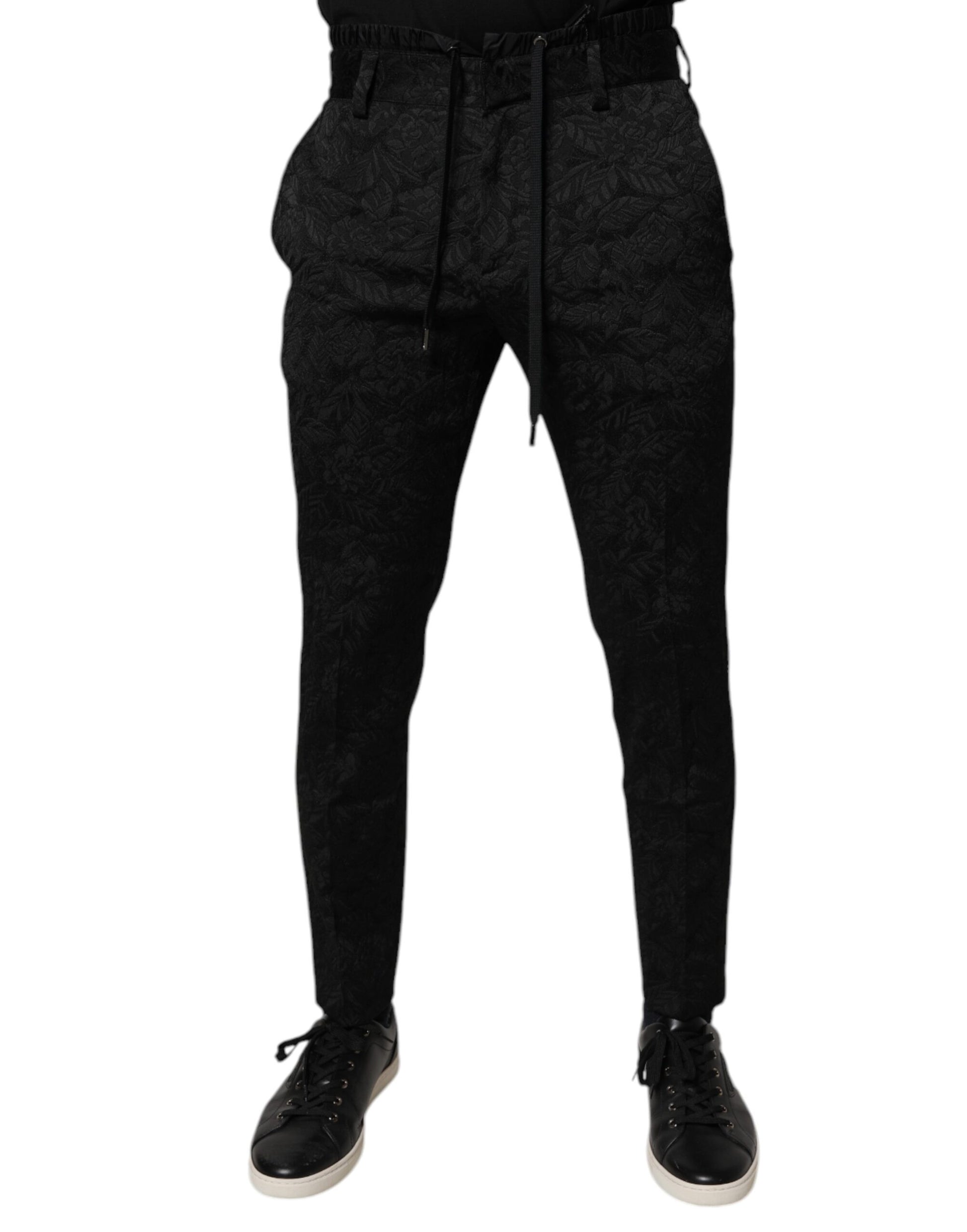 A pair of black brocade polyester skinny dress pants from the brand Dolce & Gabbana