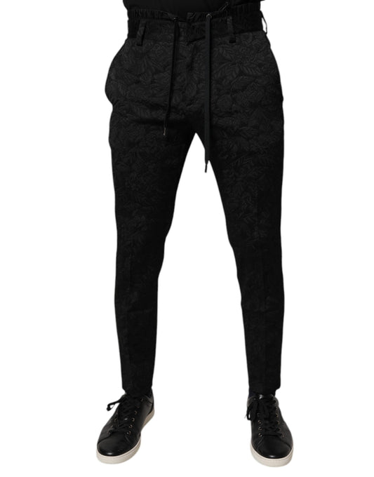 A pair of black brocade polyester skinny dress pants from the brand Dolce & Gabbana