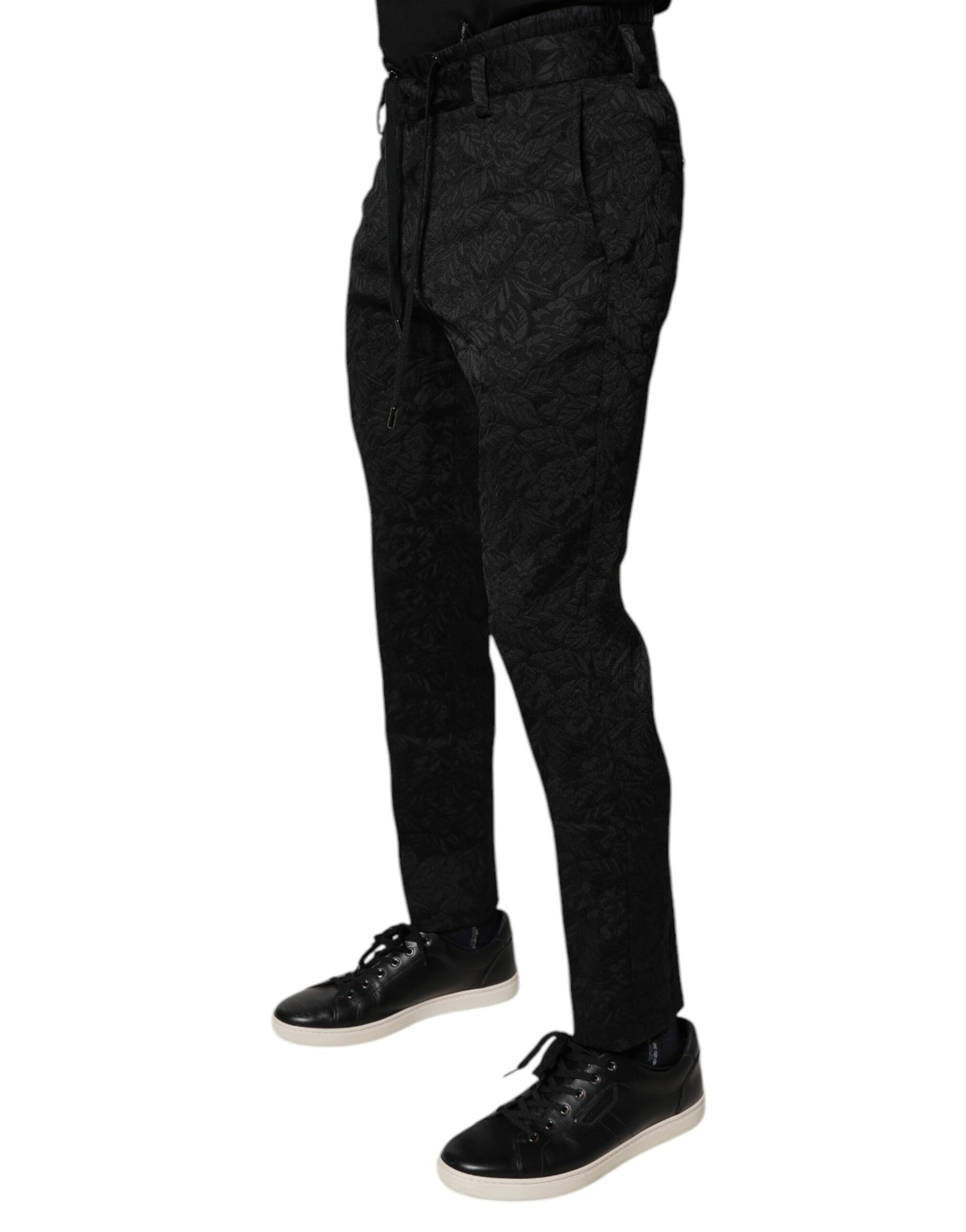 A pair of black brocade polyester skinny dress pants from Dolce & Gabbana