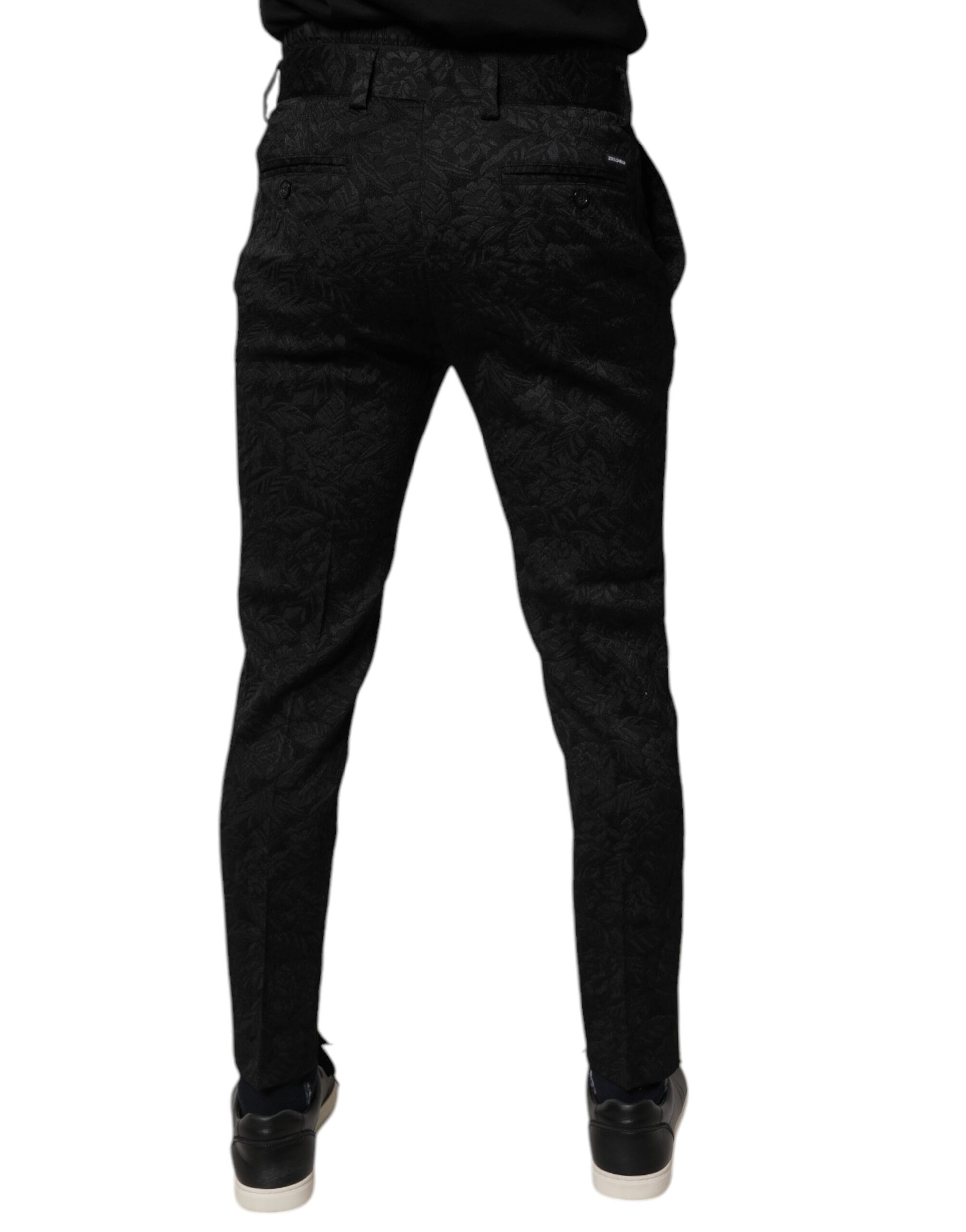 A pair of black brocade polyester skinny dress pants from the brand Dolce & Gabbana