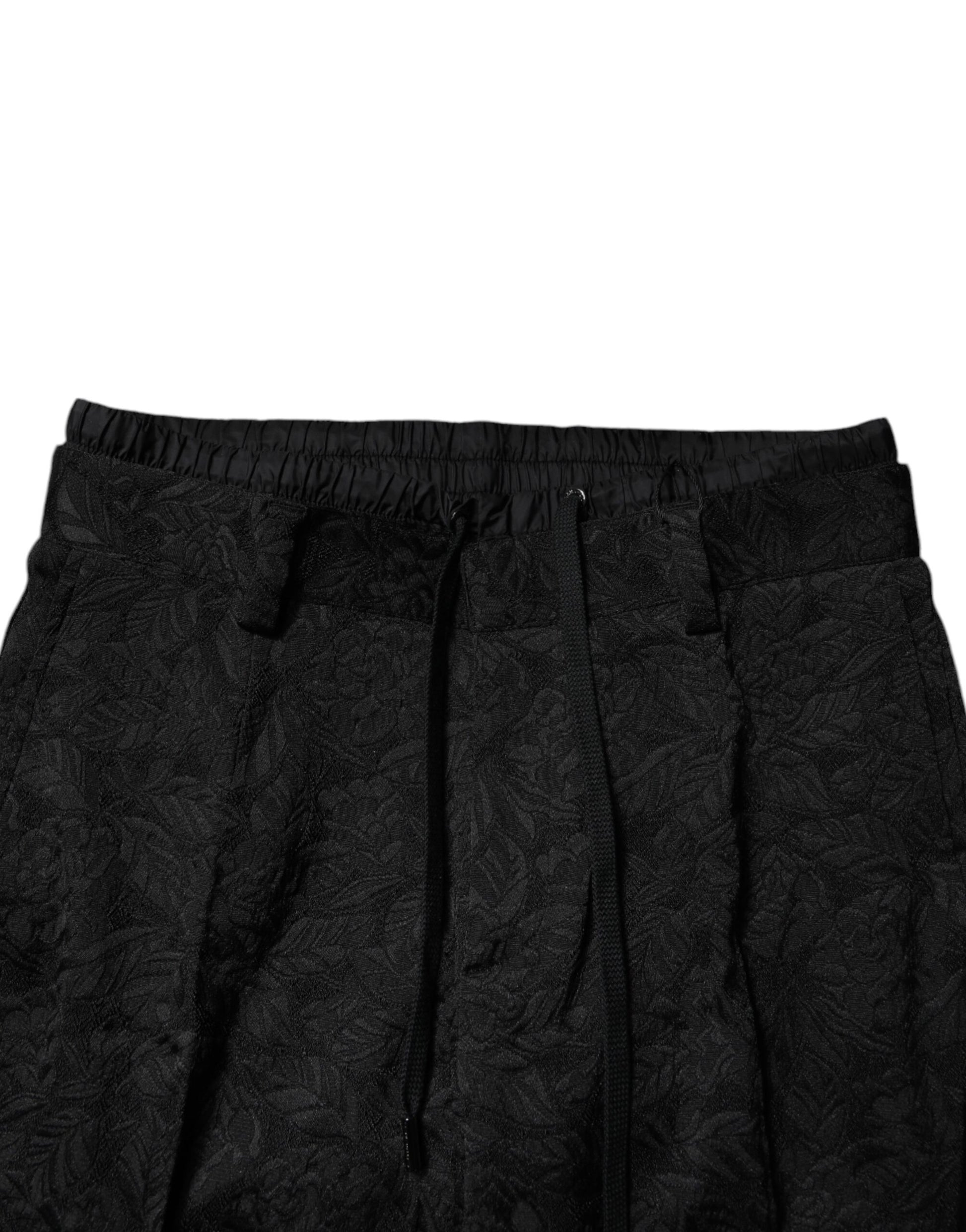 A pair of black brocade polyester skinny dress pants from the brand Dolce & Gabbana