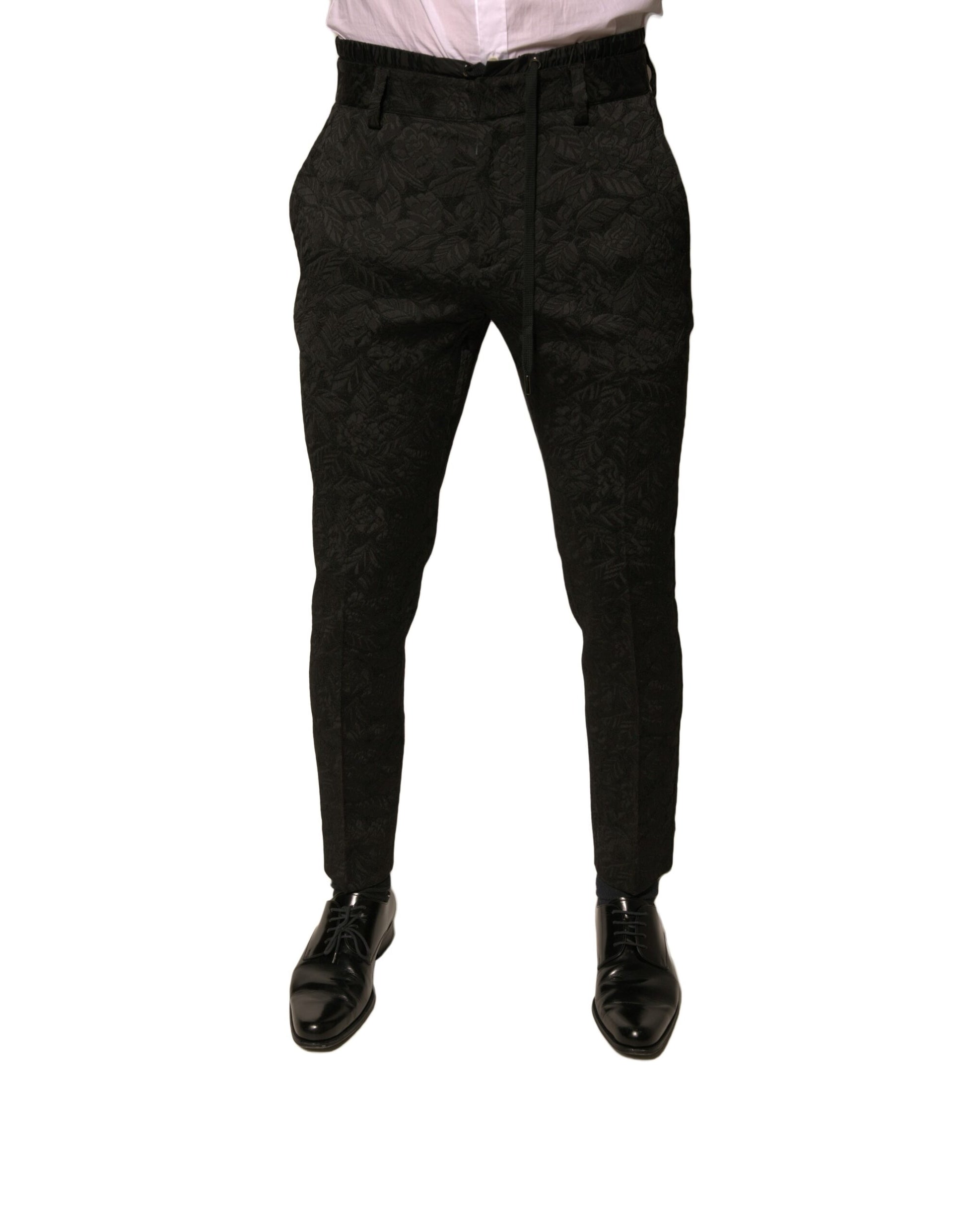 Man wearing black pants and shoes