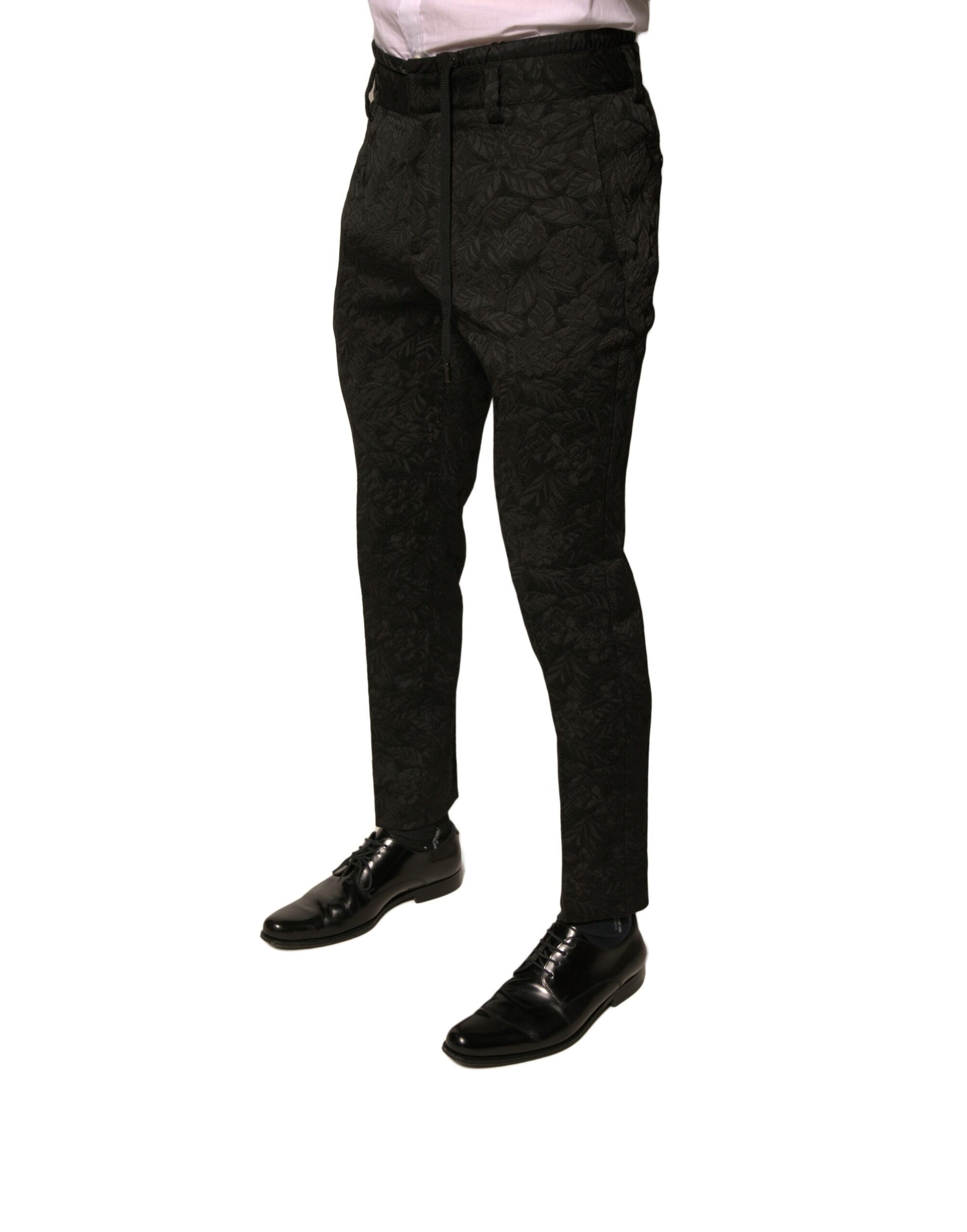 Man wearing black trousers and shoes