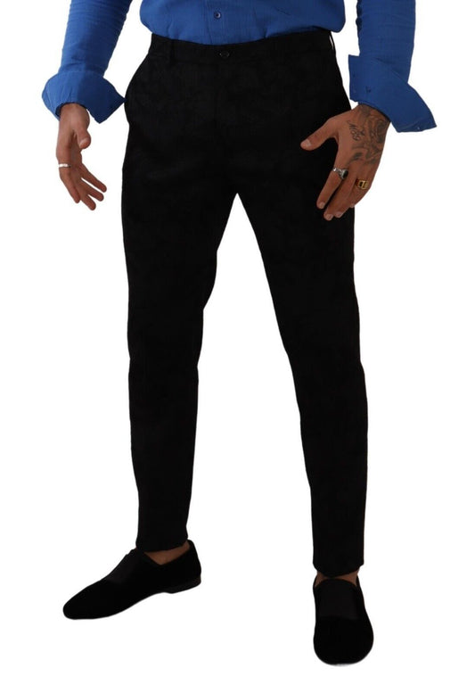Man wearing black pants and blue shirt