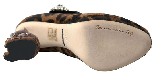 A single shoe against a neutral background. The shoe appears to be a women's flat with a decorative pattern on the upper