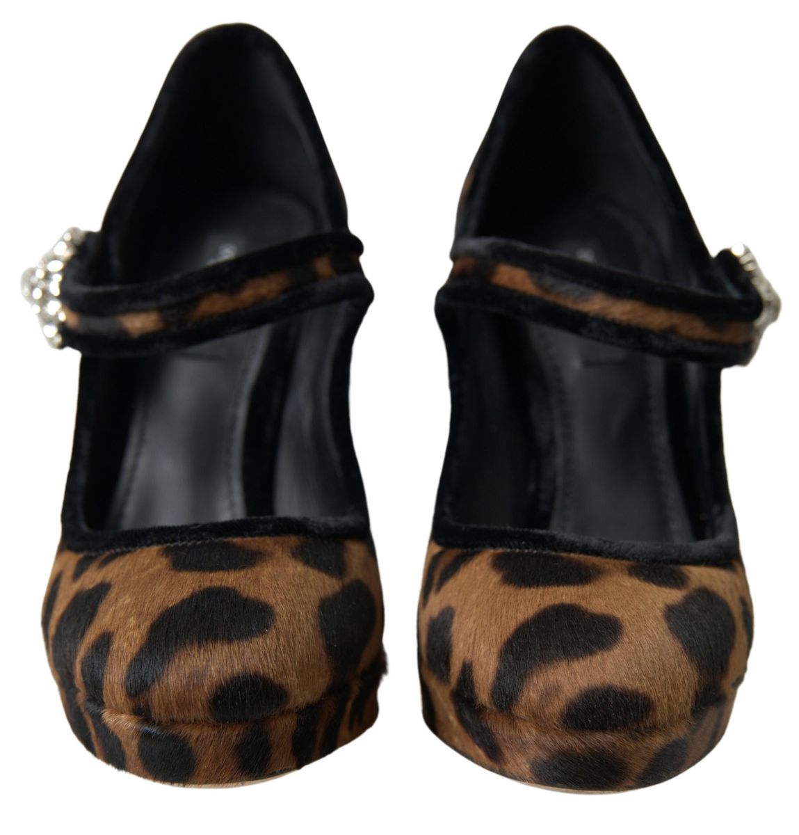 Pair of women's shoes with black upper and brown fur trim