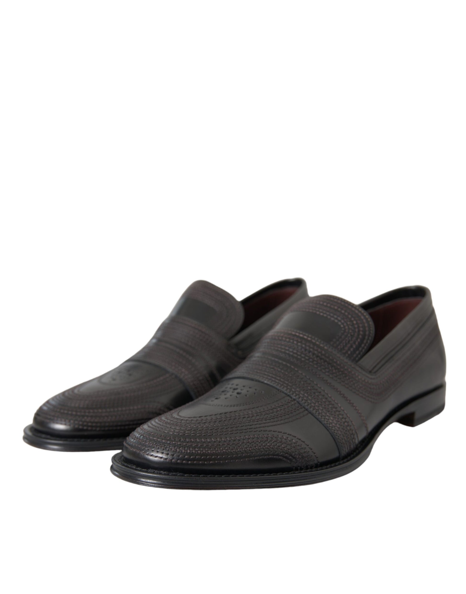 Pair of black leather dress shoes with laces