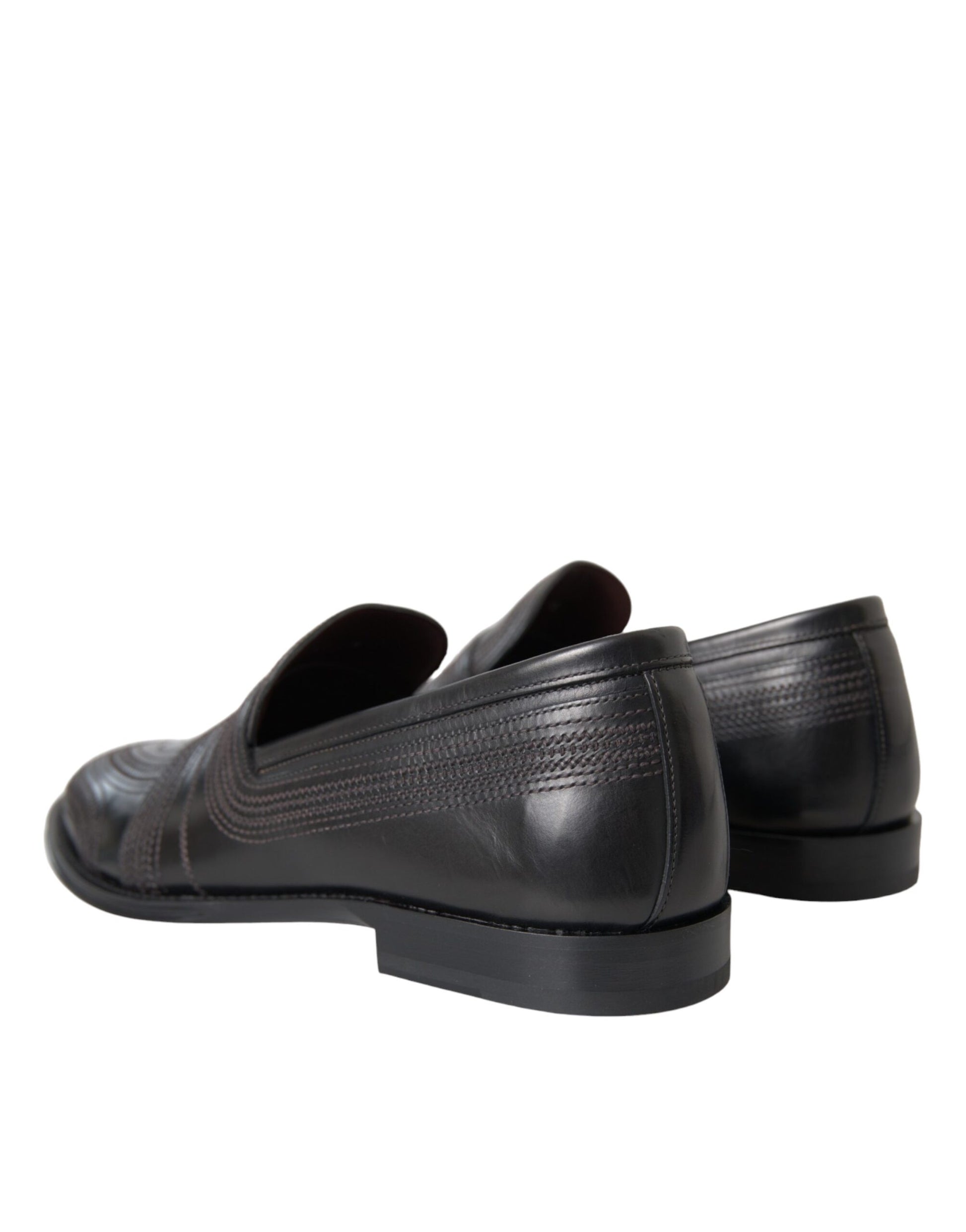 Pair of black dress shoes with laces