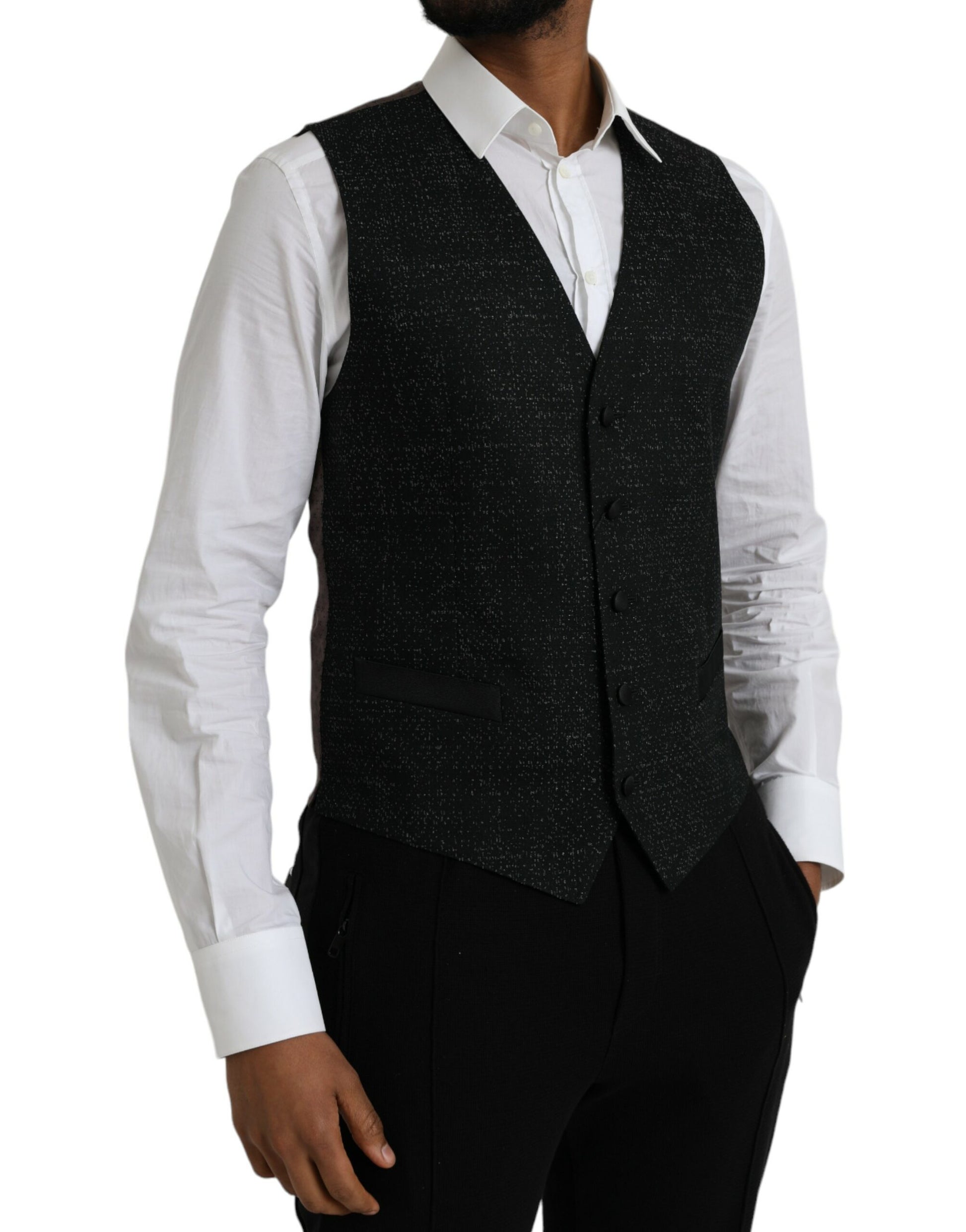 A black vest with brown silk detailing, part of a formal dress suit