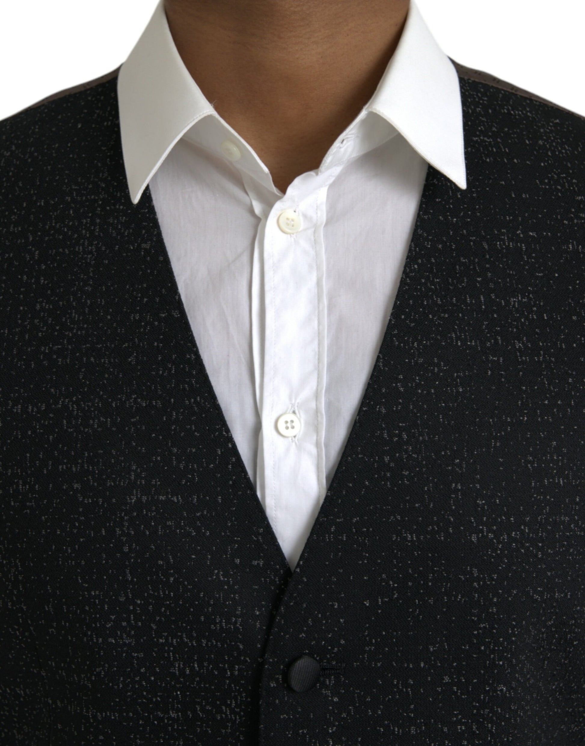 A black and brown silk waistcoat with a vest design