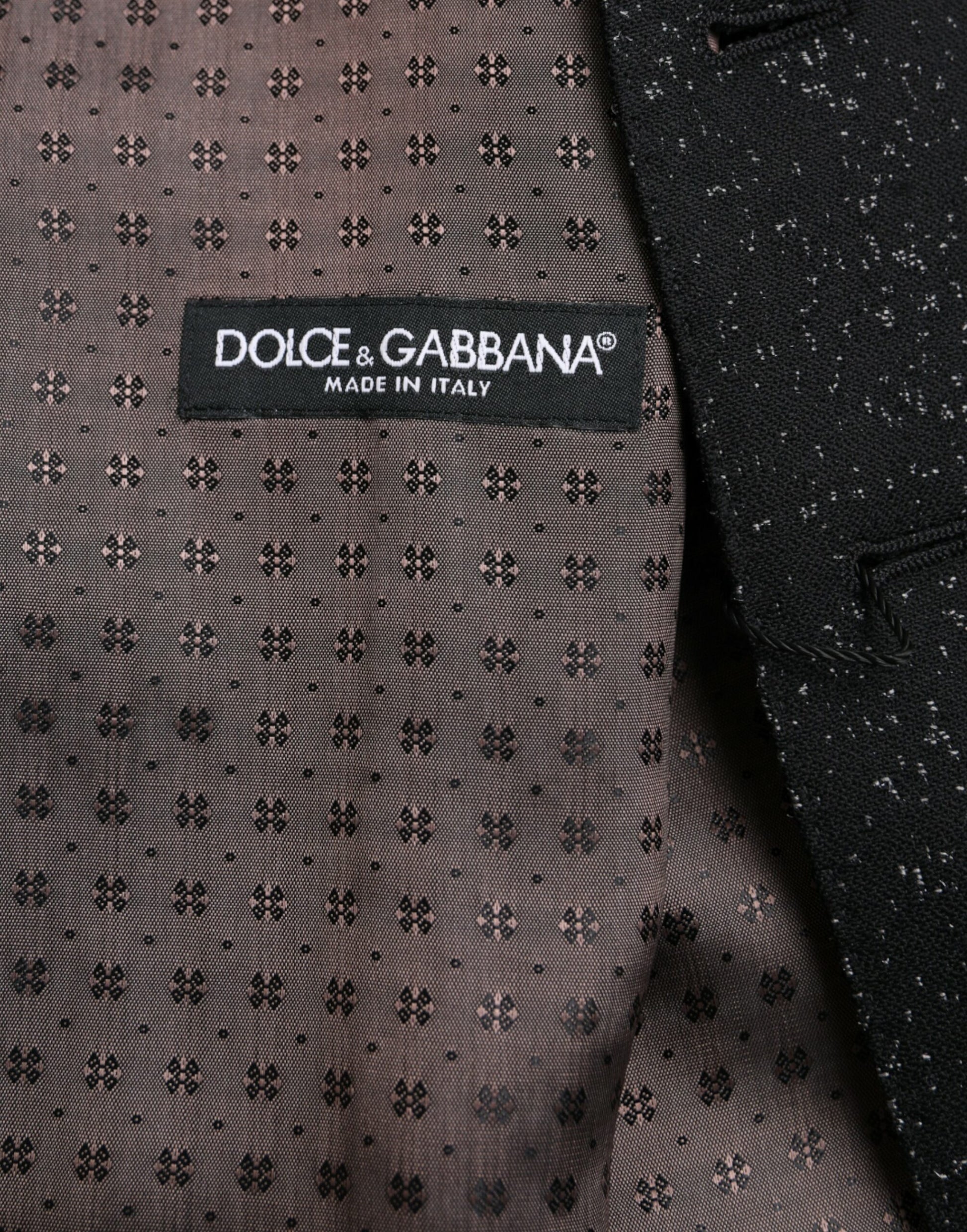 A black and brown silk waistcoat from Dolce & Gabbana, featuring a patterned design