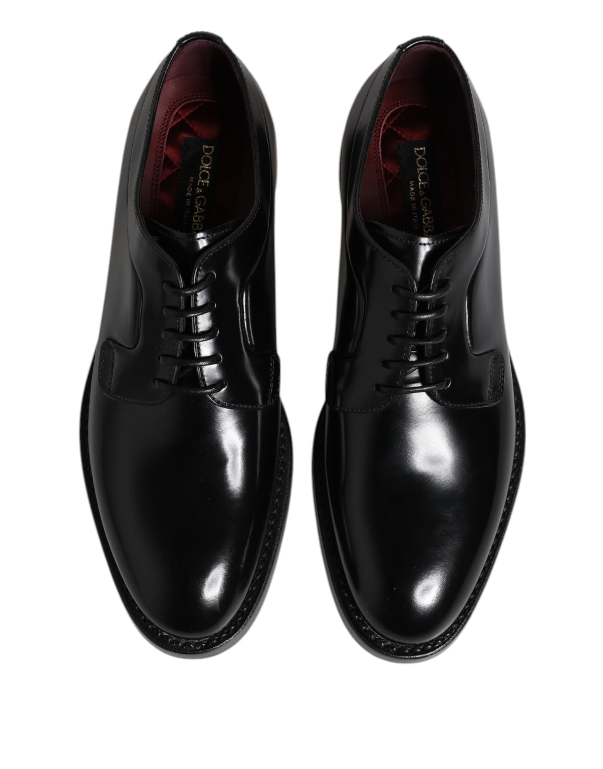 Pair of black lace-up dress shoes with red lining and sole, made from calf leather