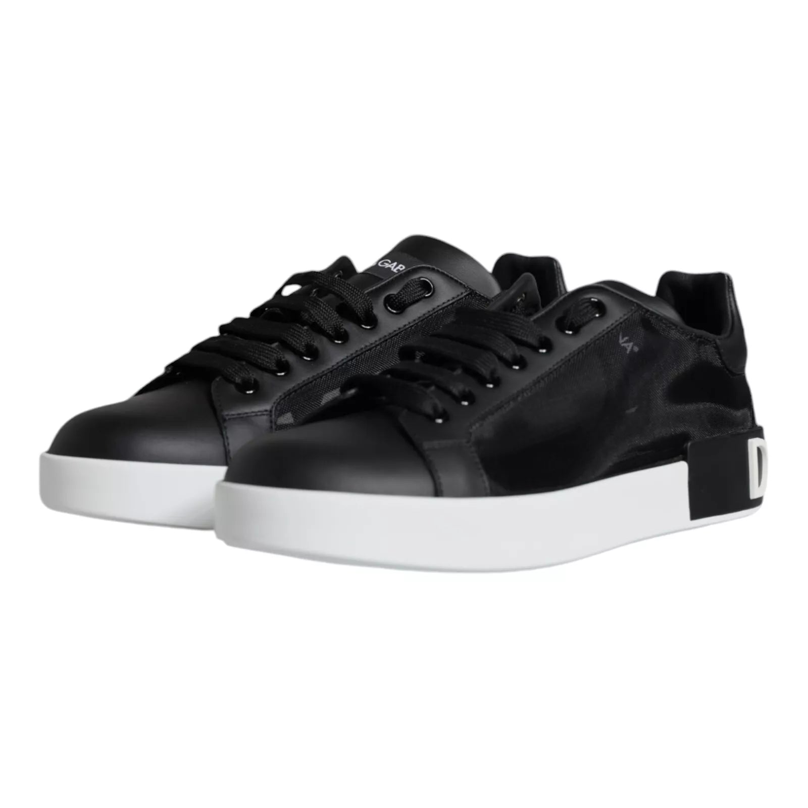 Black leather sneakers with white soles, featuring a lace-up design and embossed logo on side