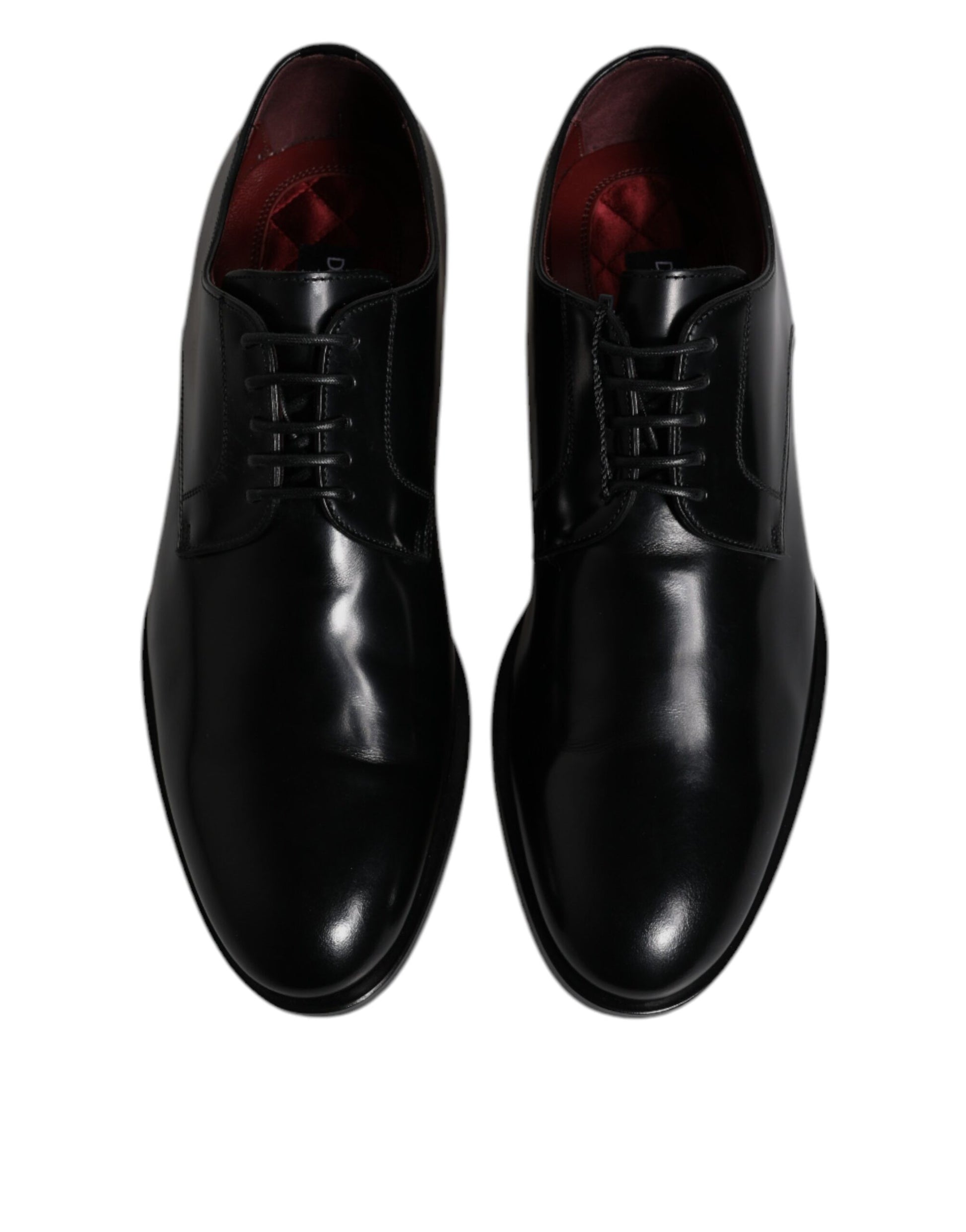 Pair of black leather lace-up dress shoes with red accents