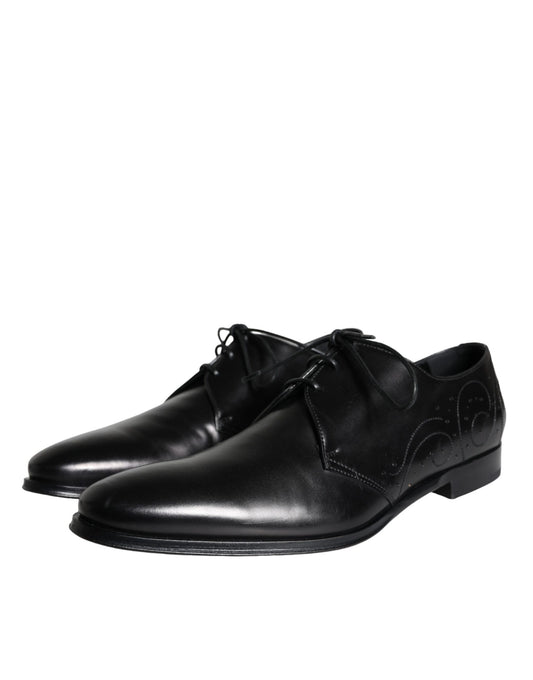 Pair of black leather dress shoes with laces, featuring a derby style and possibly from the brand Dolce & Gabbana