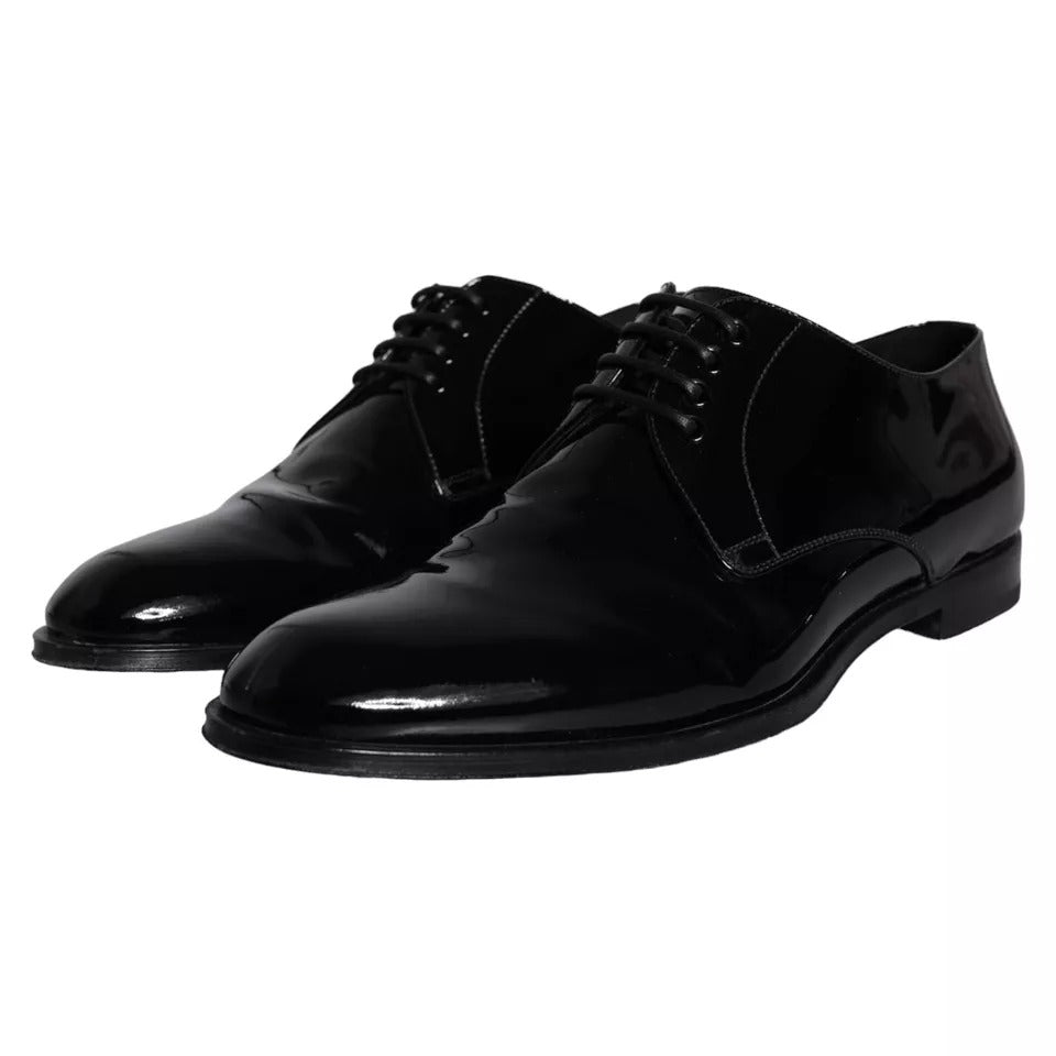 Pair of black leather dress shoes with laces and a shiny finish, possibly from the brand Dolce & Gabbana