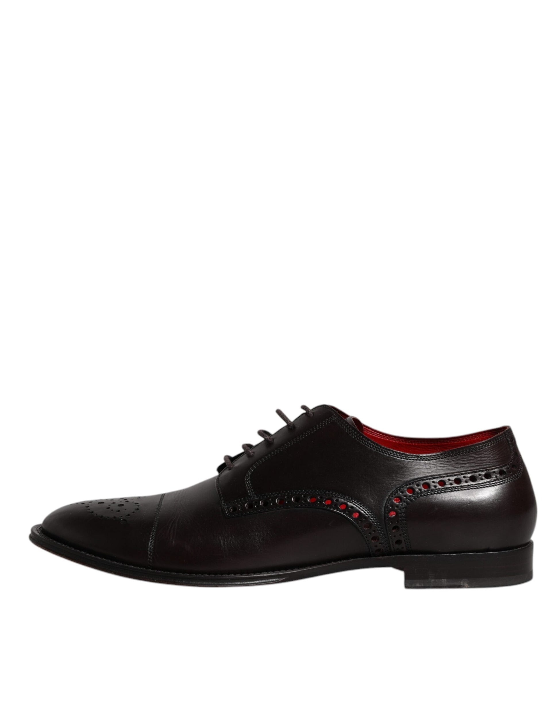 A pair of black leather dress shoes with red laces and a bow tie design