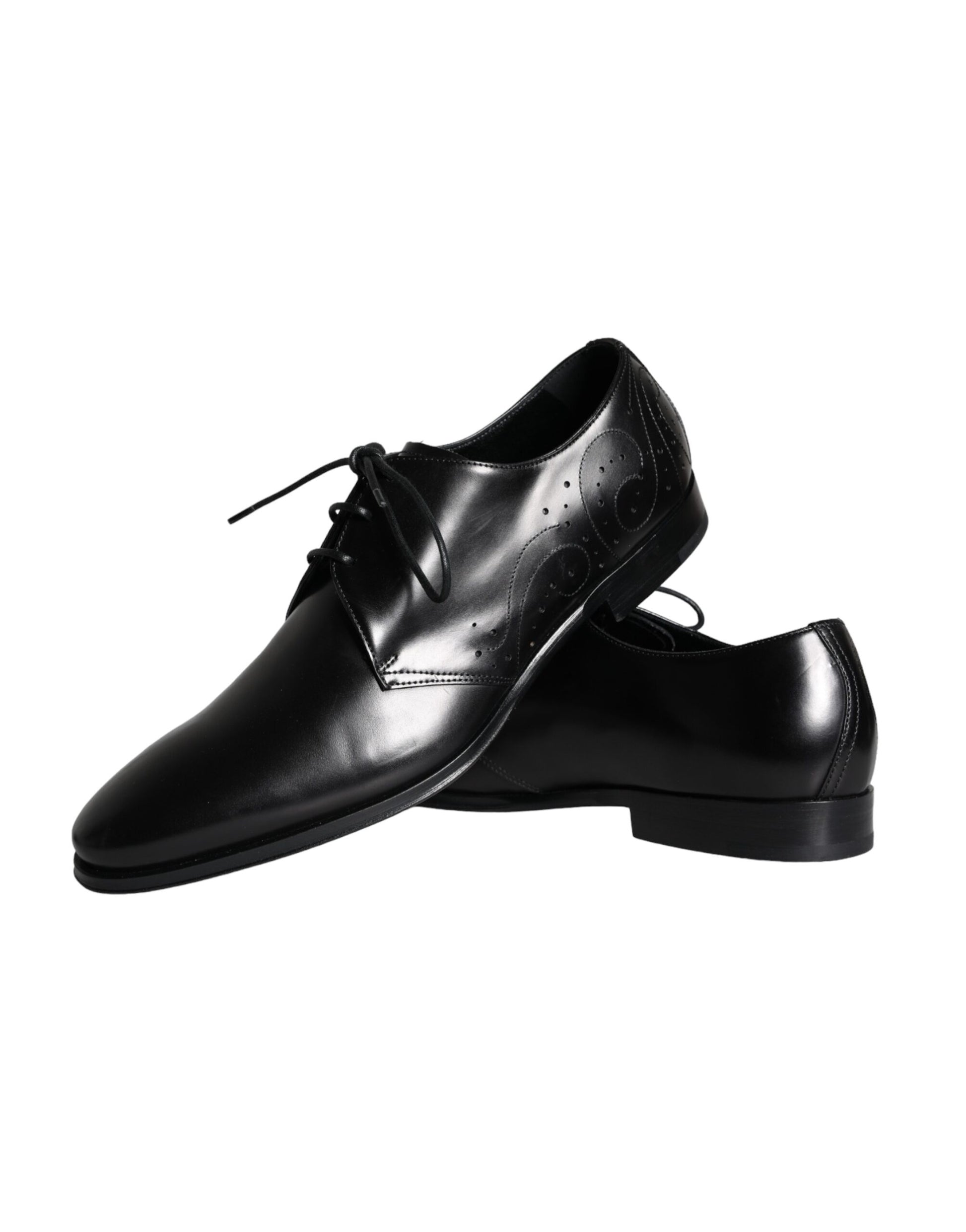Pair of black leather dress shoes with laces and a bow tie design on the vamp