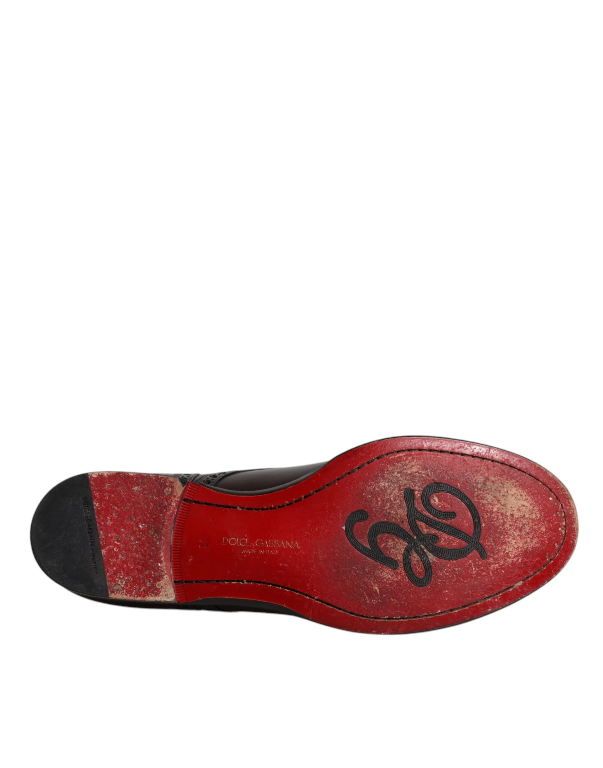 Red leather dress shoe with black laces and logo on side