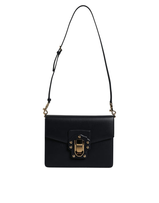 Black leather handbag with gold accents