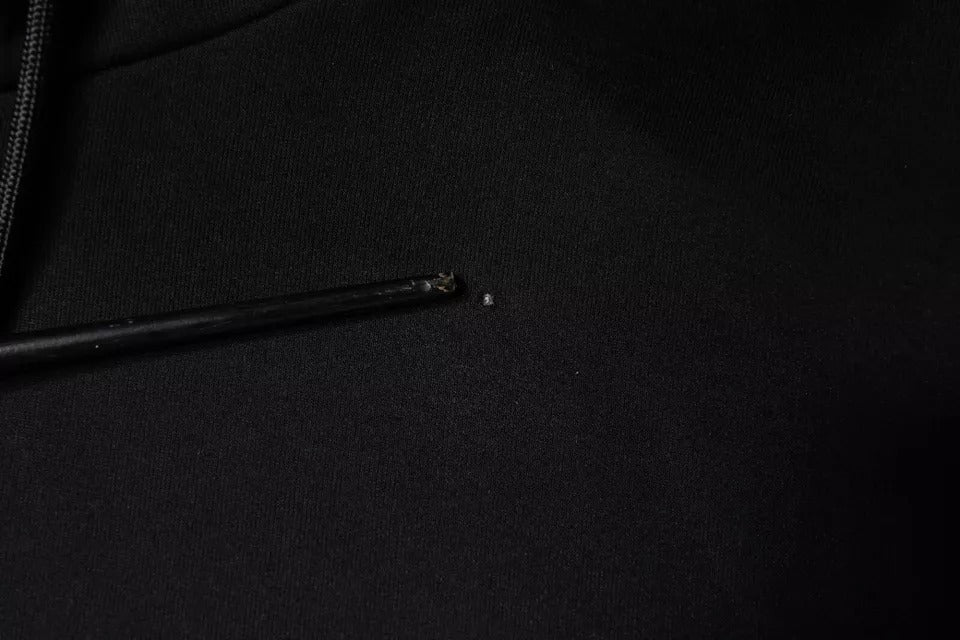 Black pen on black surface