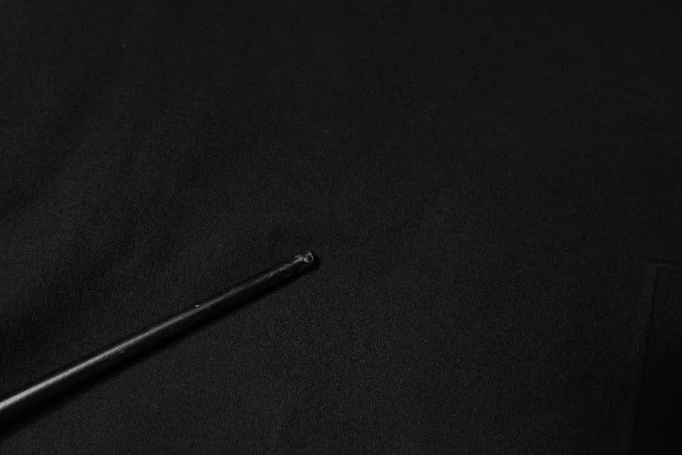 Black pen on black surface