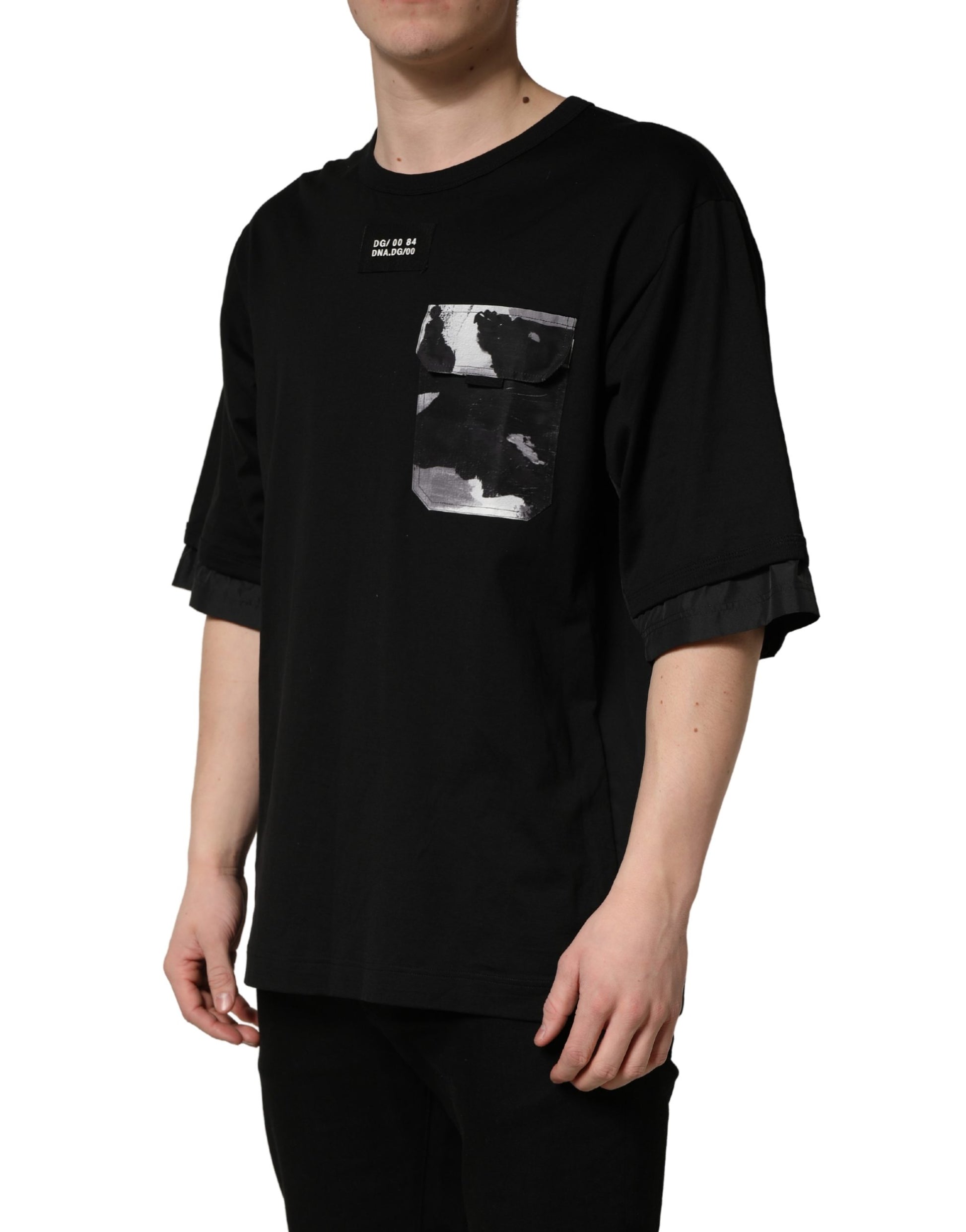 A black oversized t-shirt with camouflage pattern and a pocket on the front
