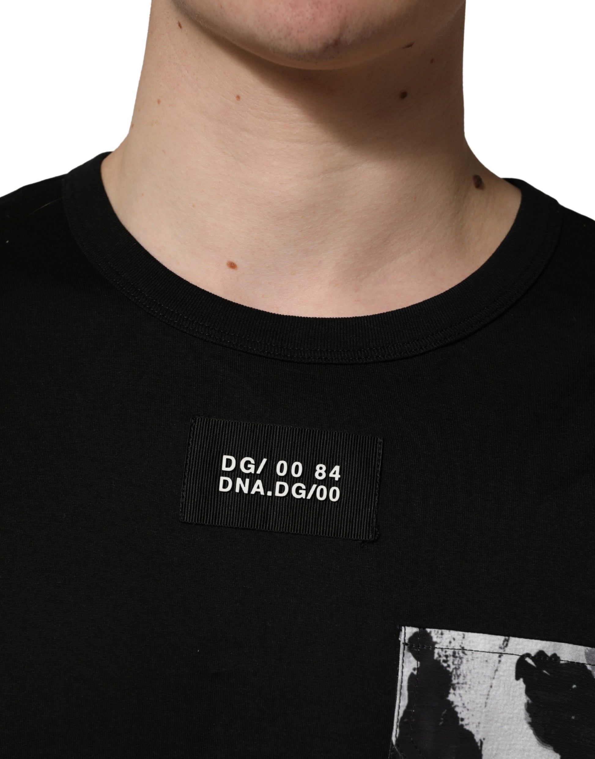 A black camouflage pocket oversized t-shirt with a visible label on the chest