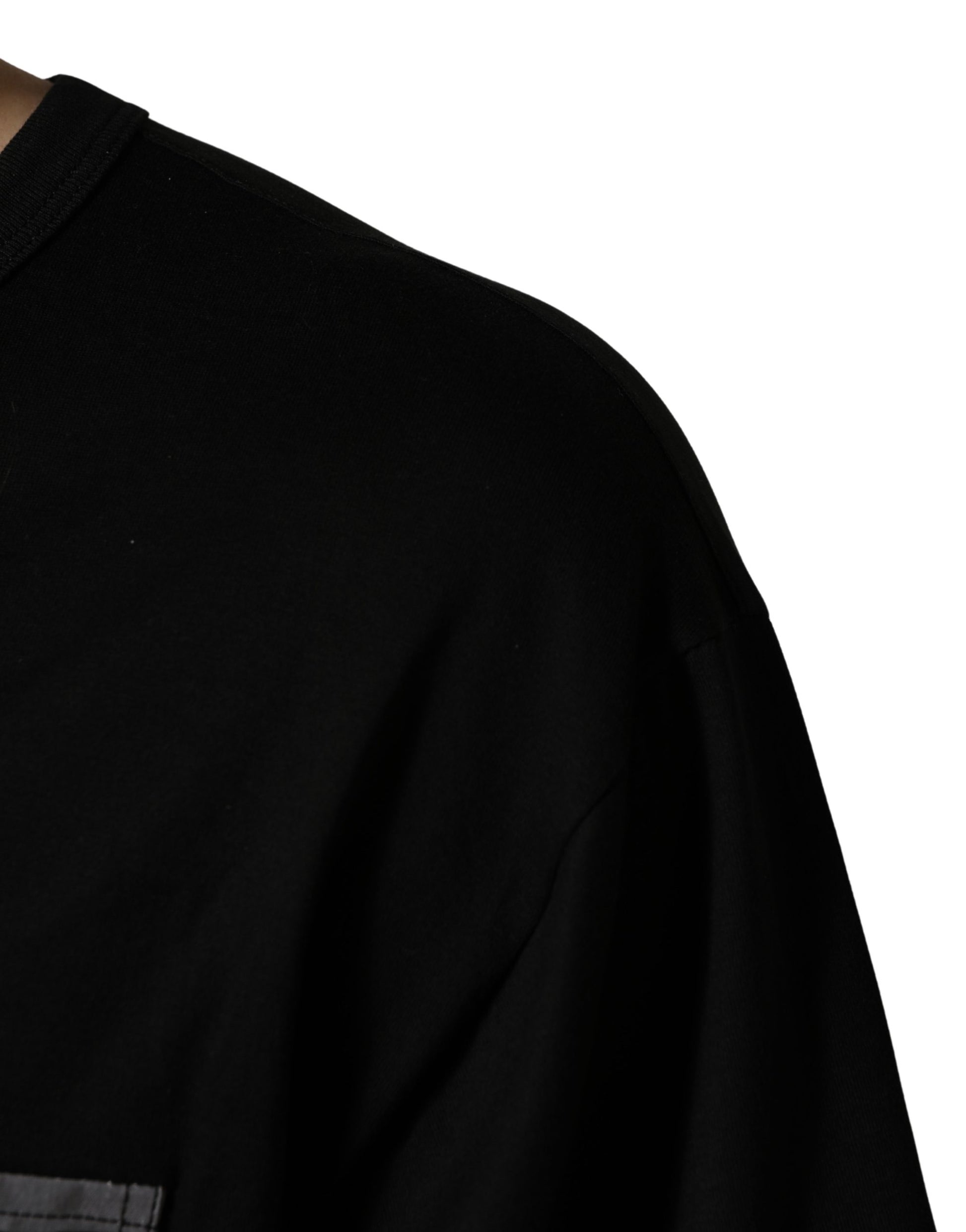A black camouflage oversized t-shirt with a pocket on the left chest