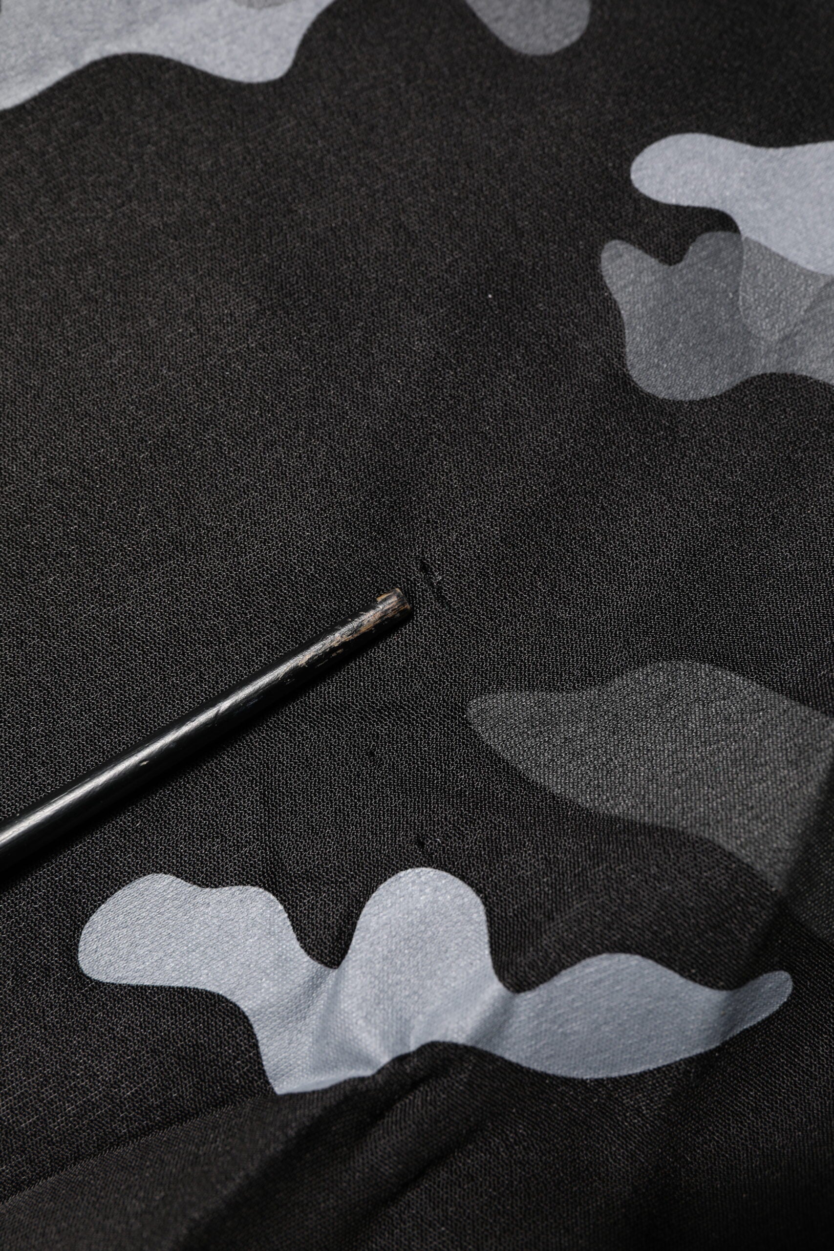 Black thread on black fabric