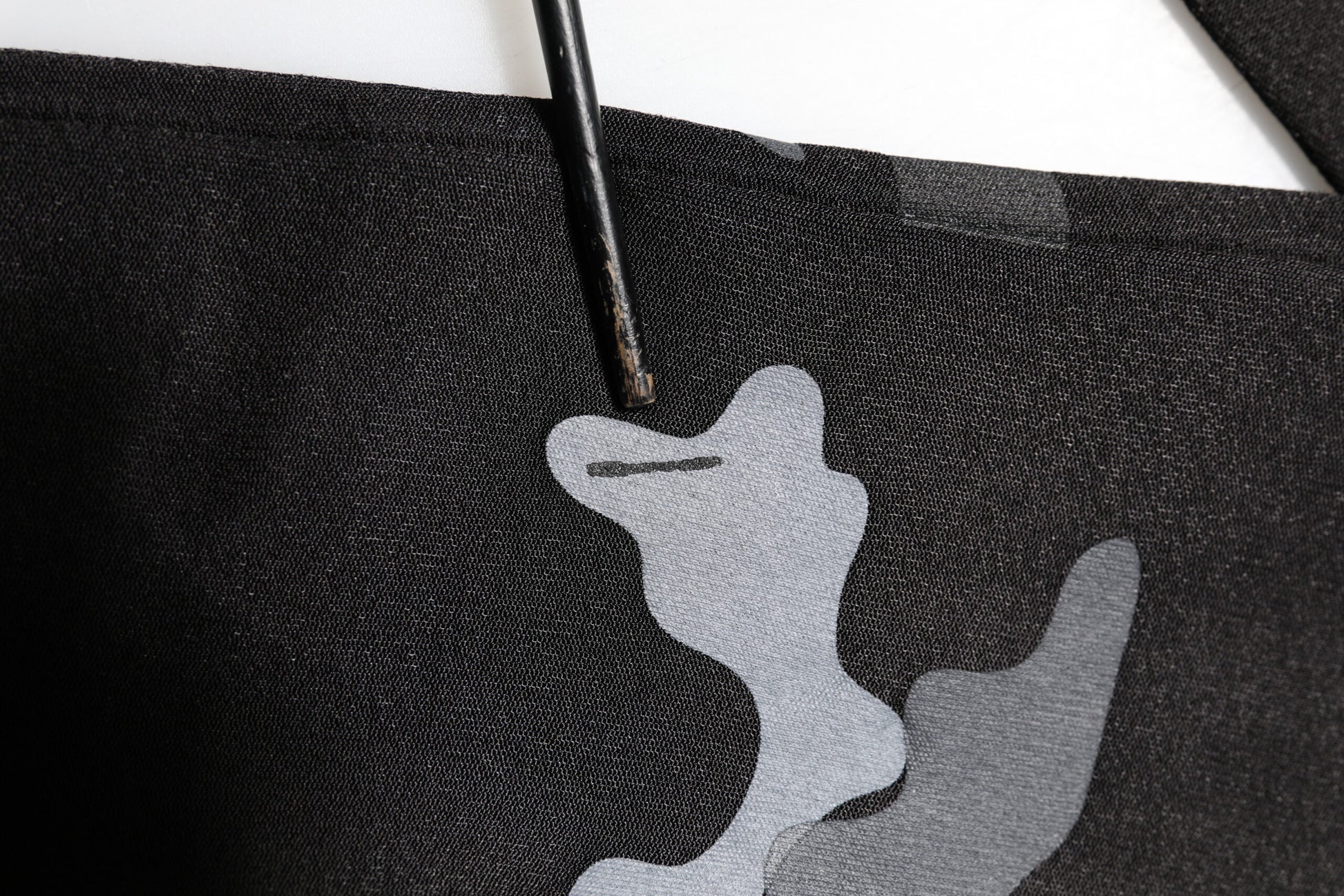 Black fabric with white design
