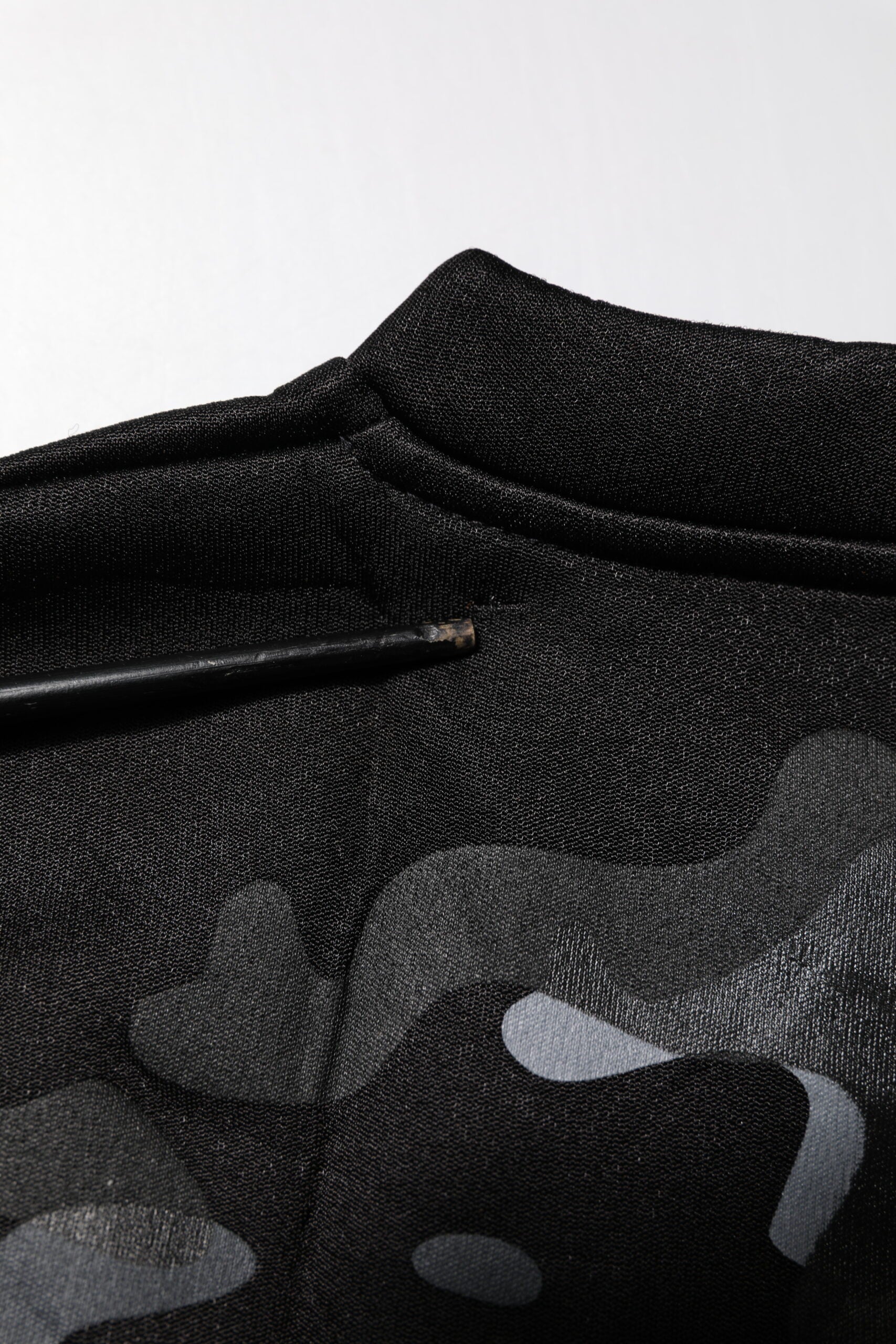 Black camouflage patterned fabric