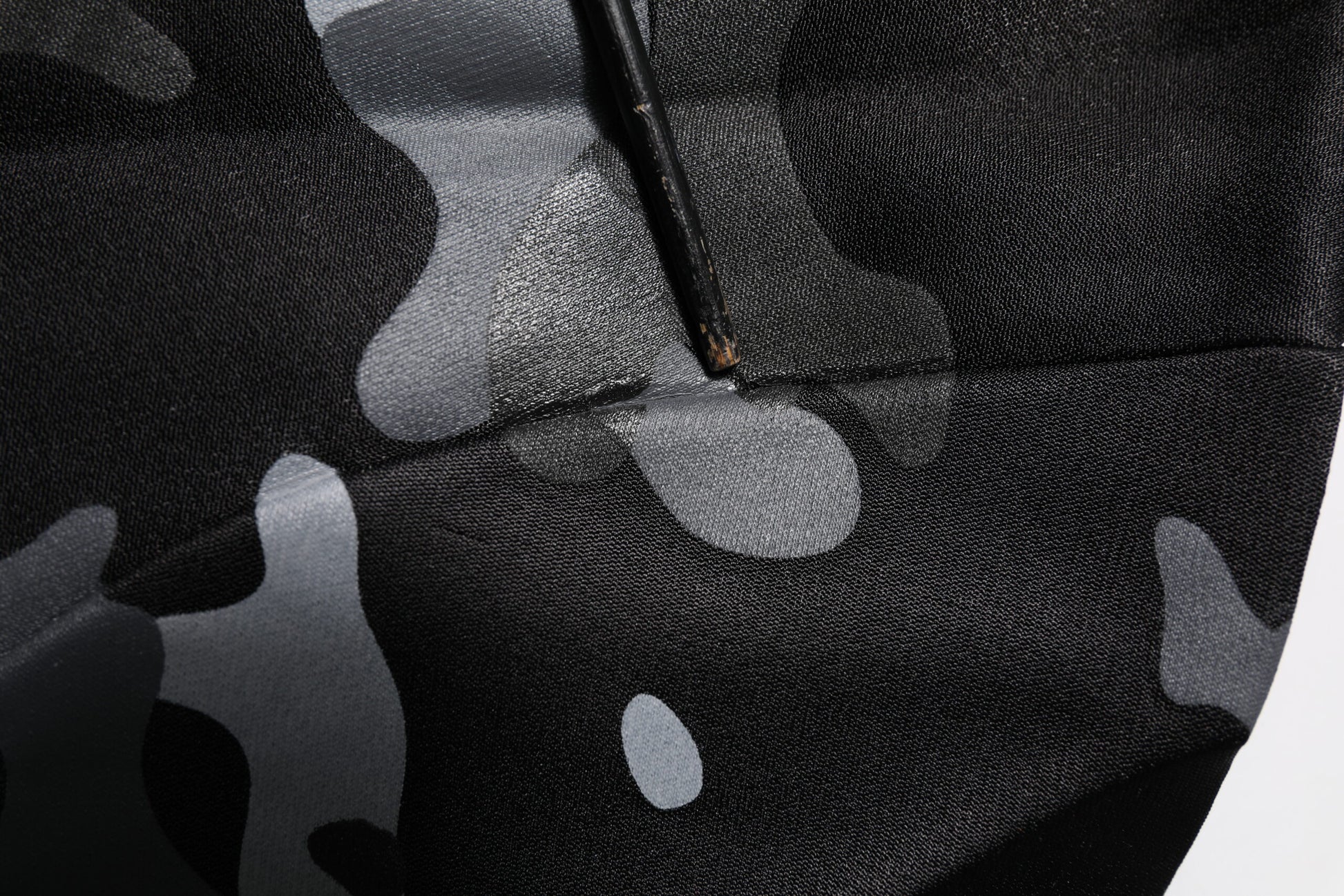 Camouflage fabric with water spots