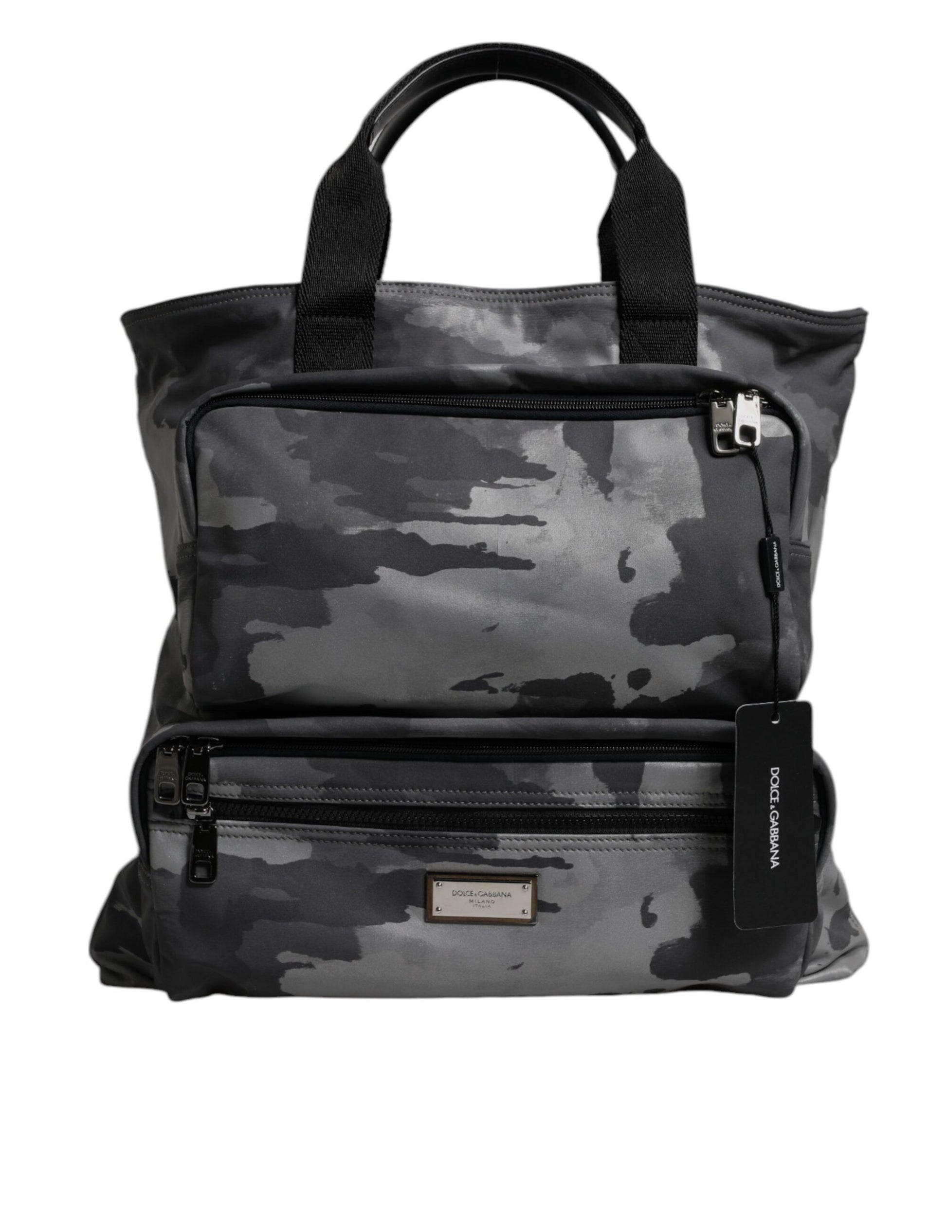 Camouflage patterned bag with multiple pockets and a handle
