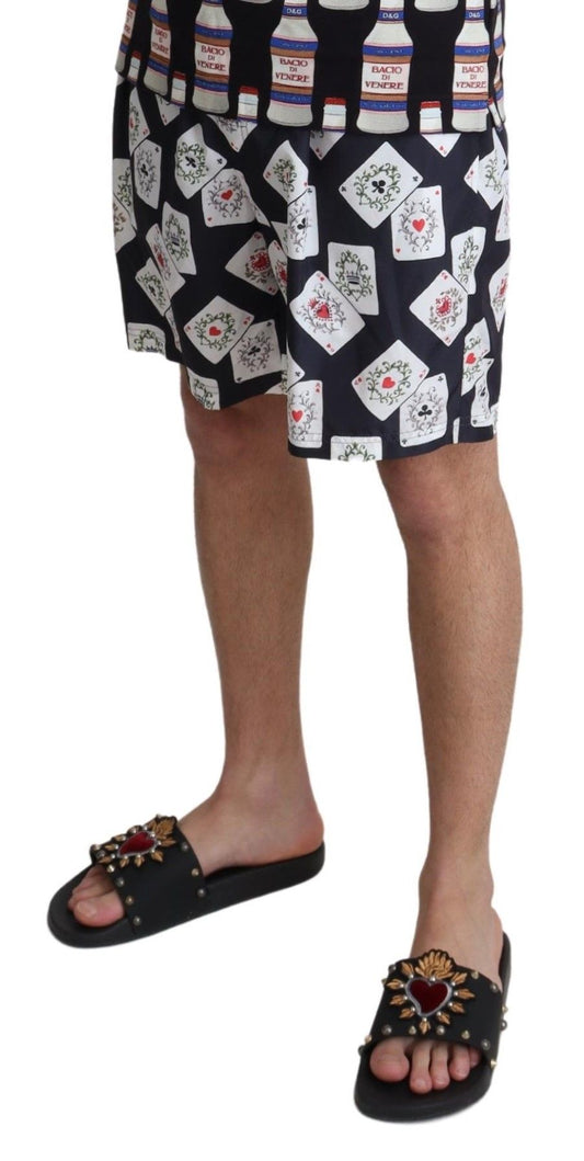 Man wearing shorts with playing cards pattern and sandals