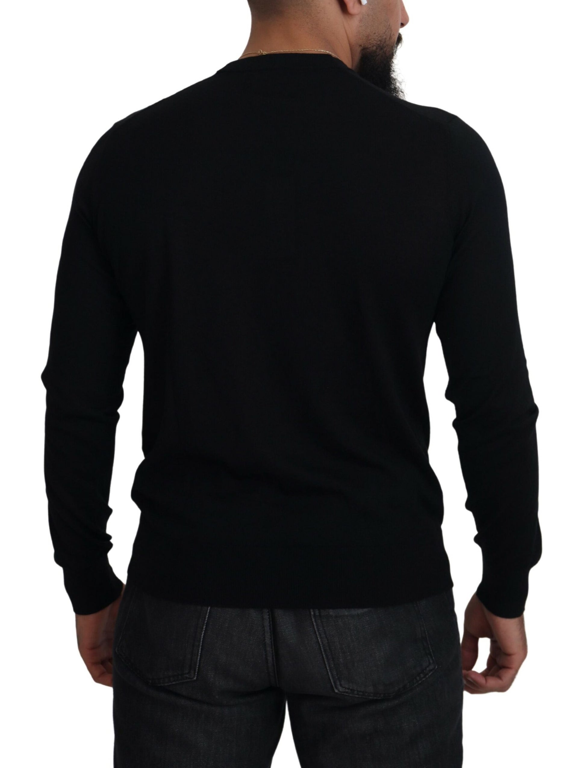 Man wearing black long sleeve shirt