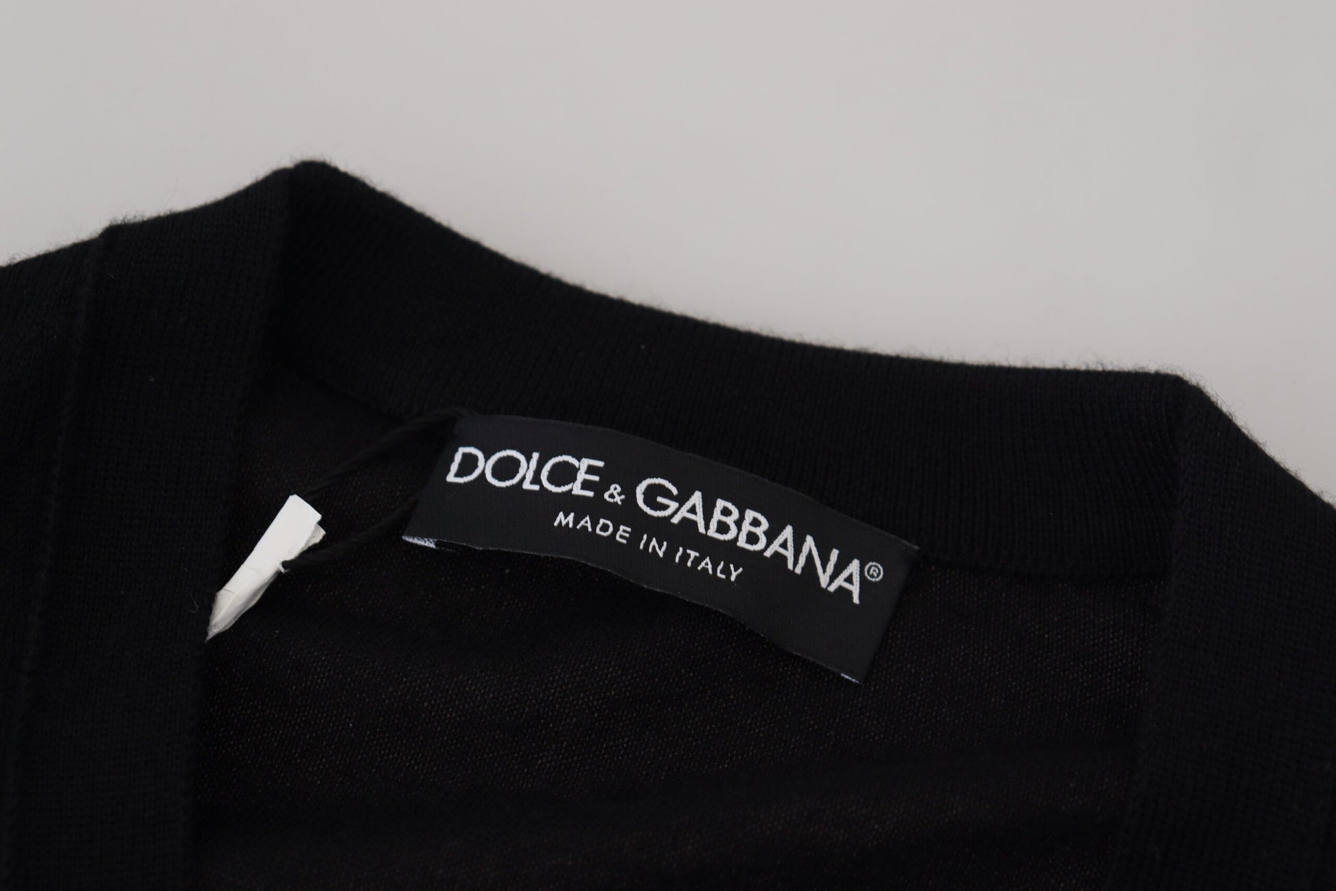 Black clothing tagged "Dolce & Gabbana Made in Italy"